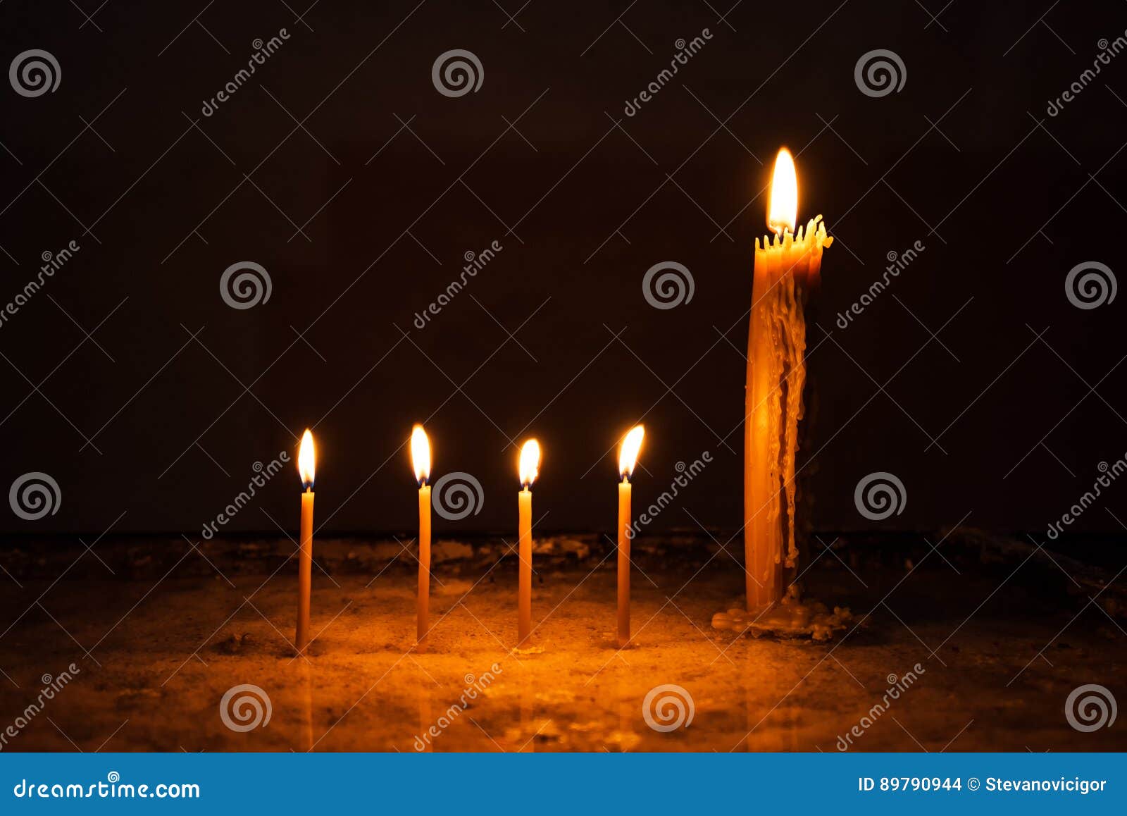 Wax church candles burning stock photo. Image of burning 89790944