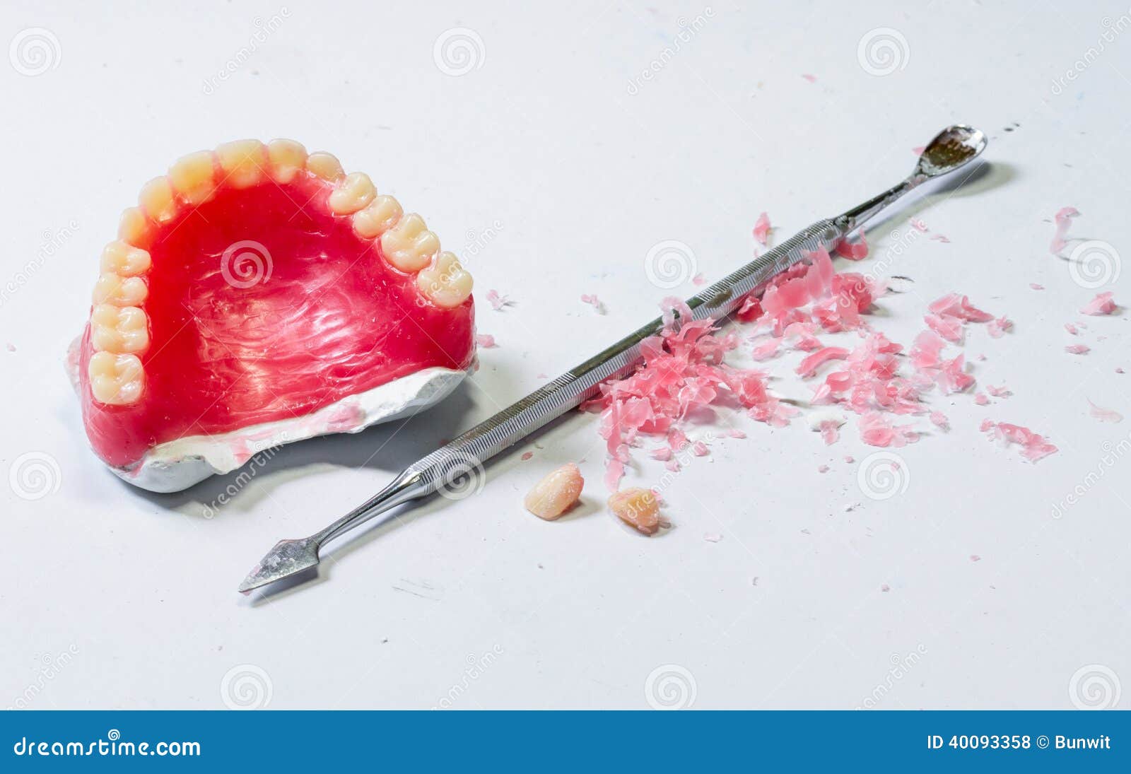 Wax Dentures Model. Table of Dental Technician Workplace. Stock Photo