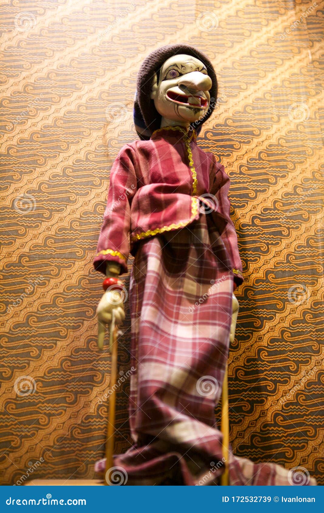 wayang golek with batik background