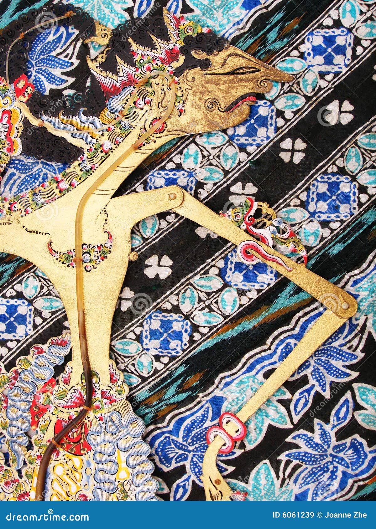 wayang kulit puppet on batik