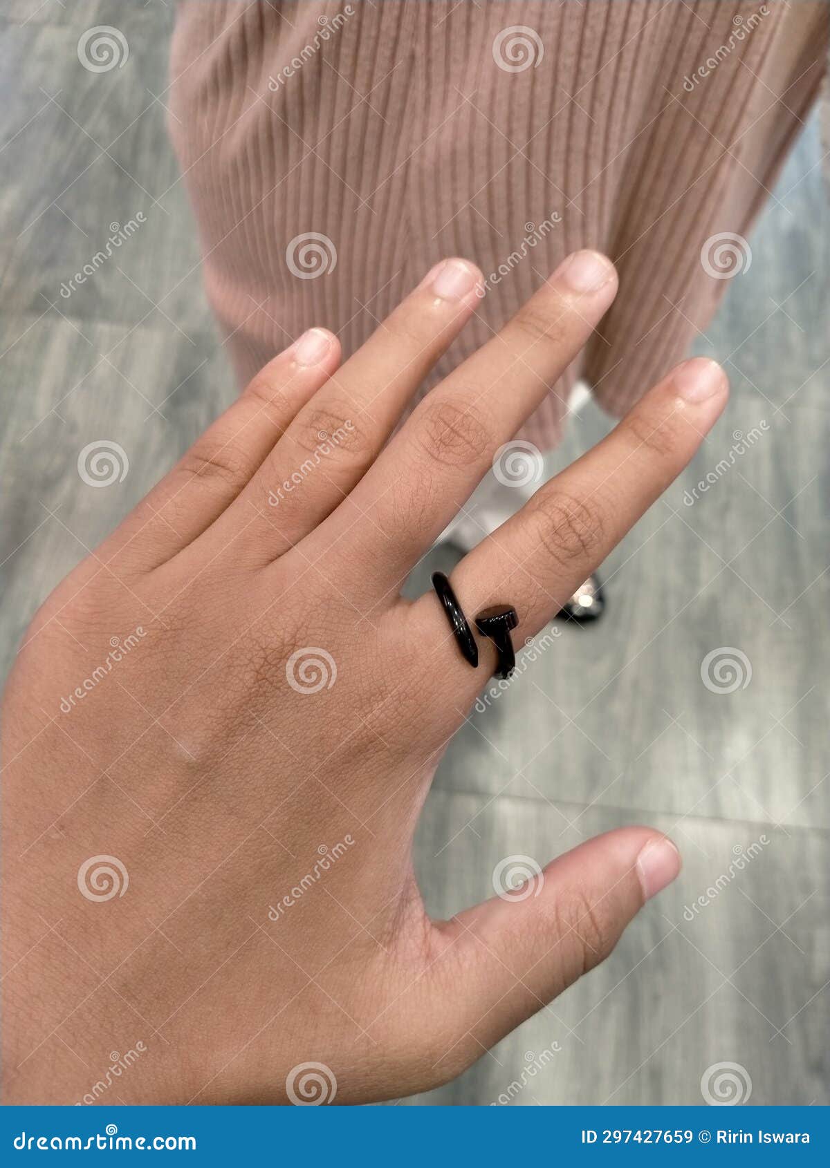 what does wearing a ring on the index finger mean