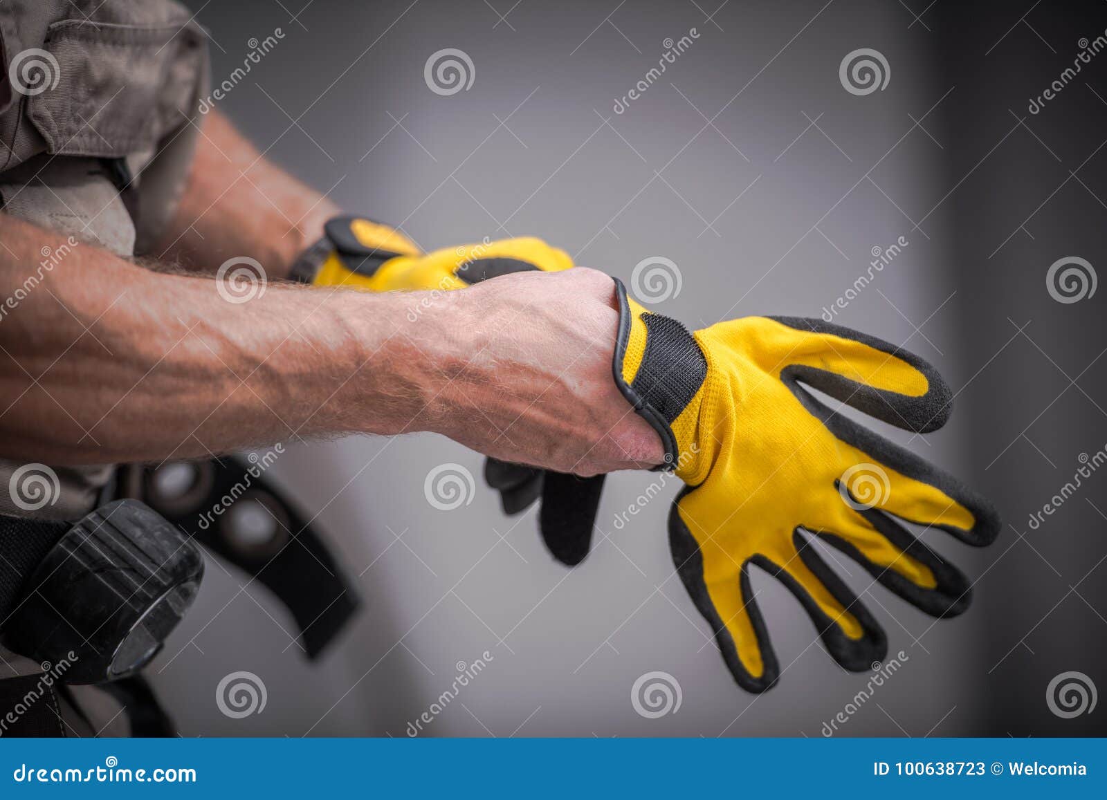 wearing safety gloves