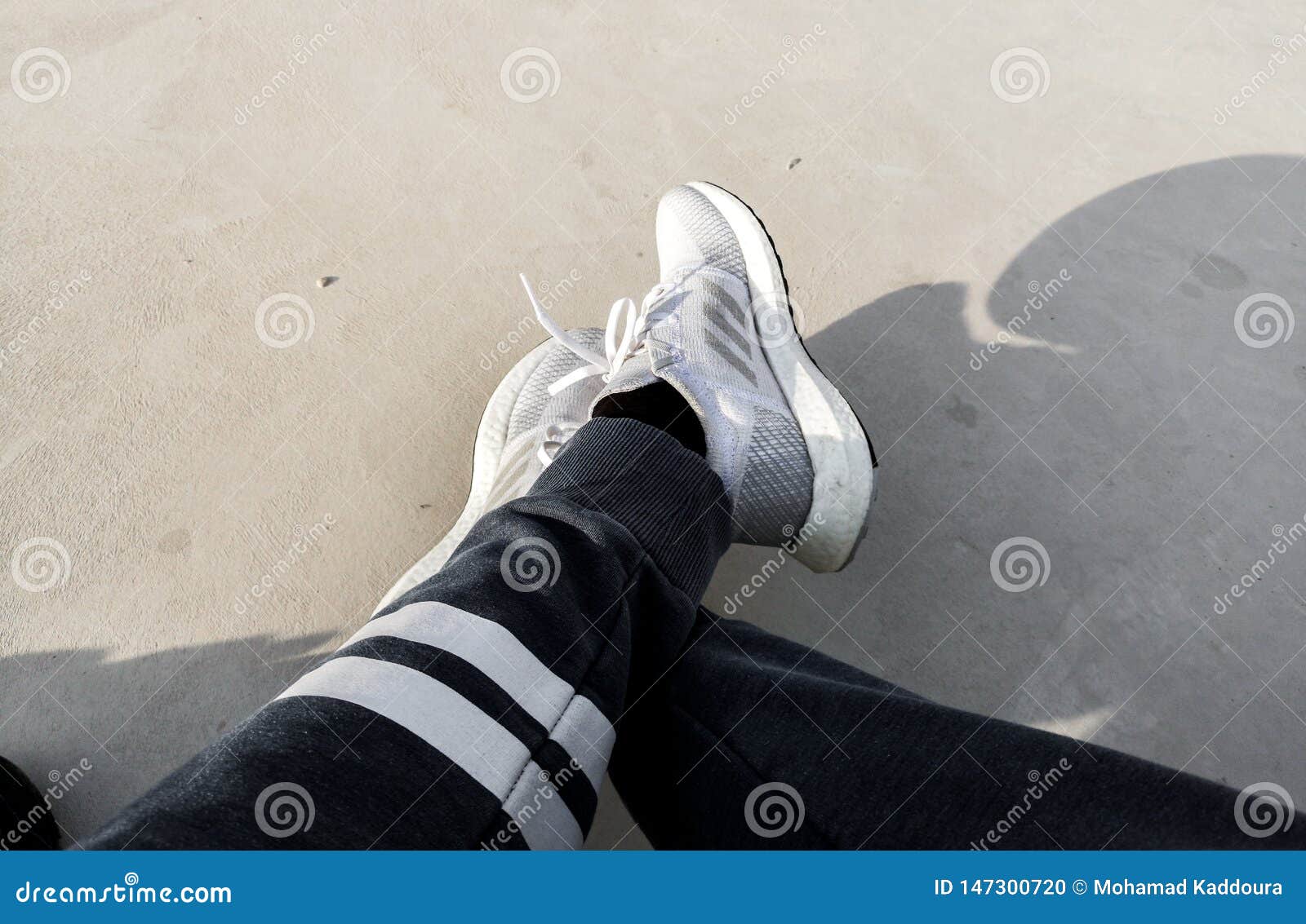 Man Wearing Sneakers With Tied Laces, Top View. April Fool`s Day ...