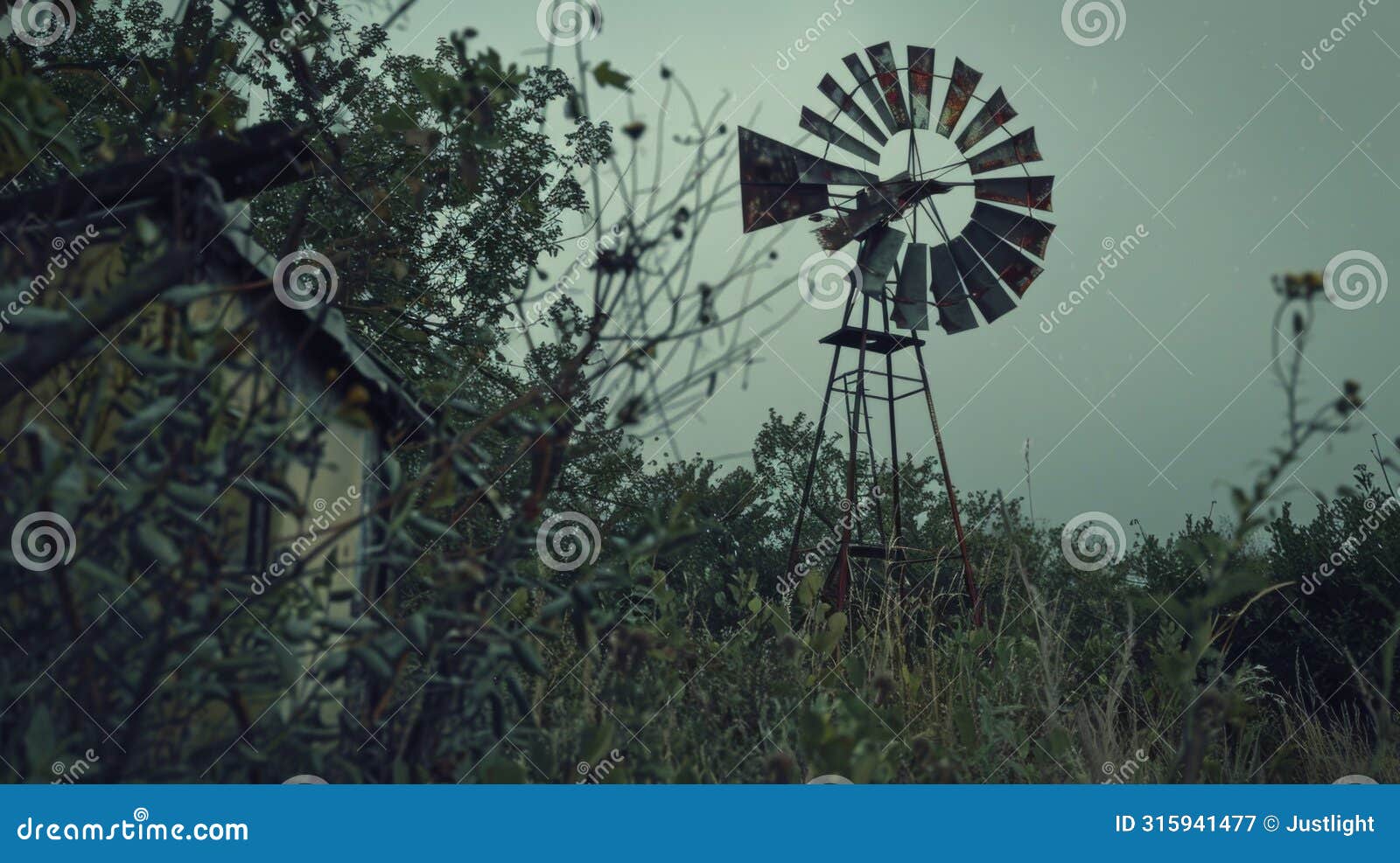 a weathered windmill creaking in the wind its rusted blades still turning as if beckoning travelers towards a cursed