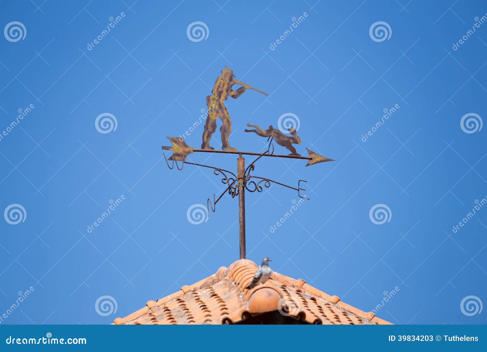 Weathervane on a roof top stock image. Image of east 39834203