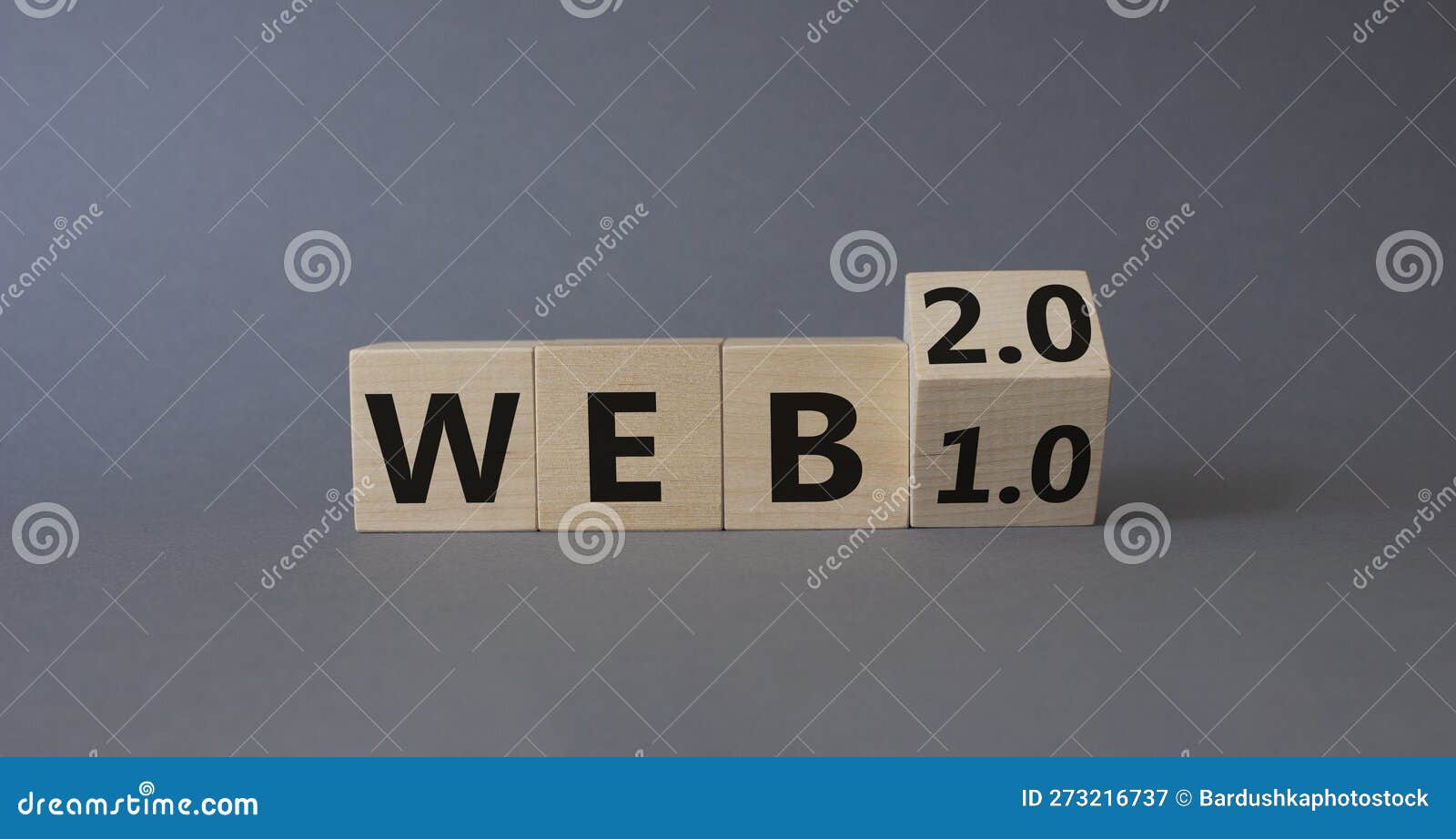 web 2 or 1 . turned wooden cubes with words web 1.0 or web 2.0. beautiful grey background. business and web concept. copy