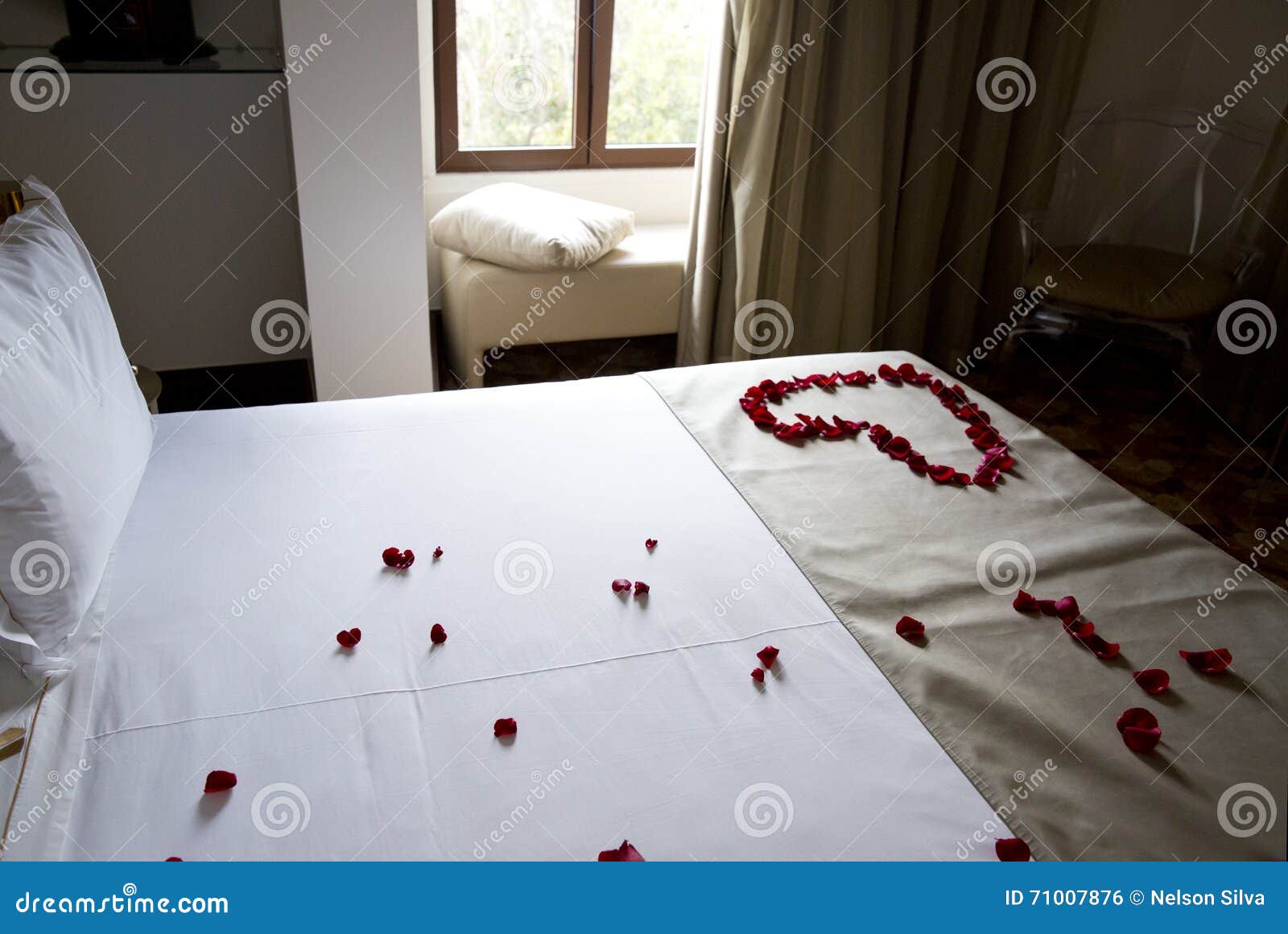 Wedding Bed Topped with Rose Petals Stock Photo Image of newlyweds