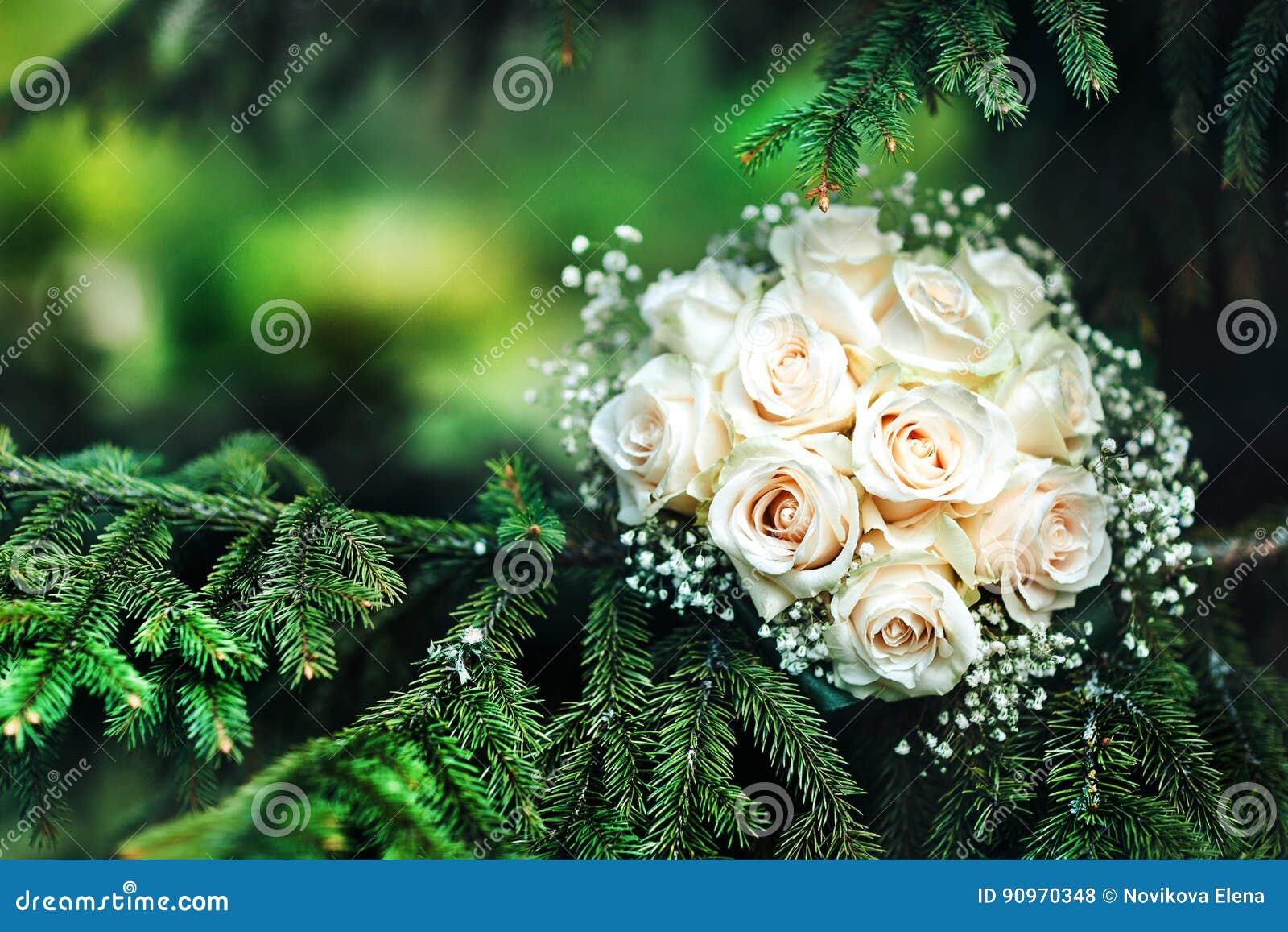Wedding Bouquet of the Bride on the Green Background Stock Photo