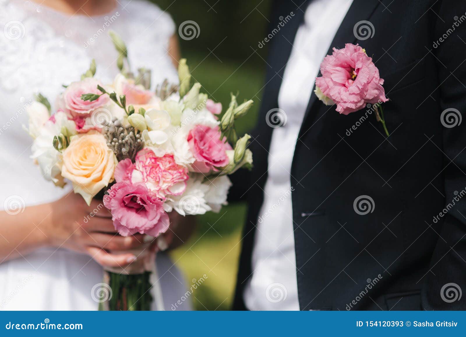 Wedding Bouquet in Brides Hands. Close Up View of Couples Hands Holding ...