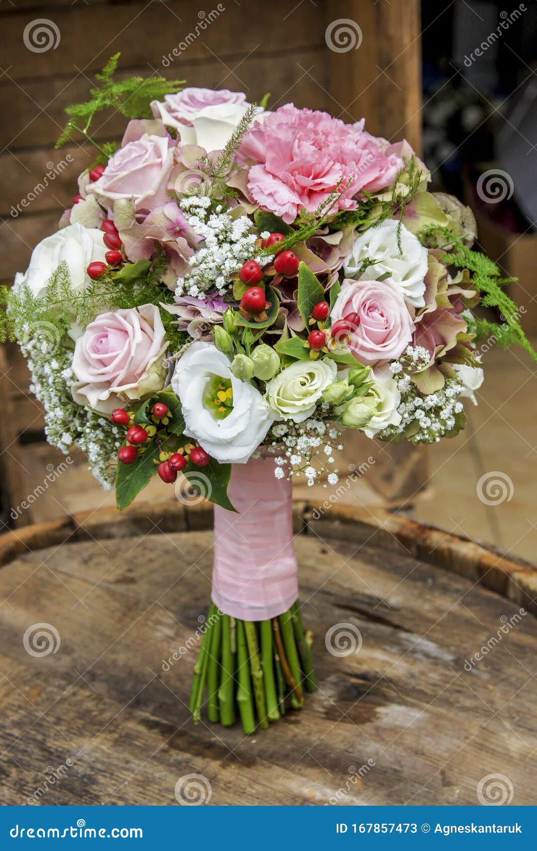 Wedding Bouquet with Carnations, Roses, Eustoma and Hypericum Stock