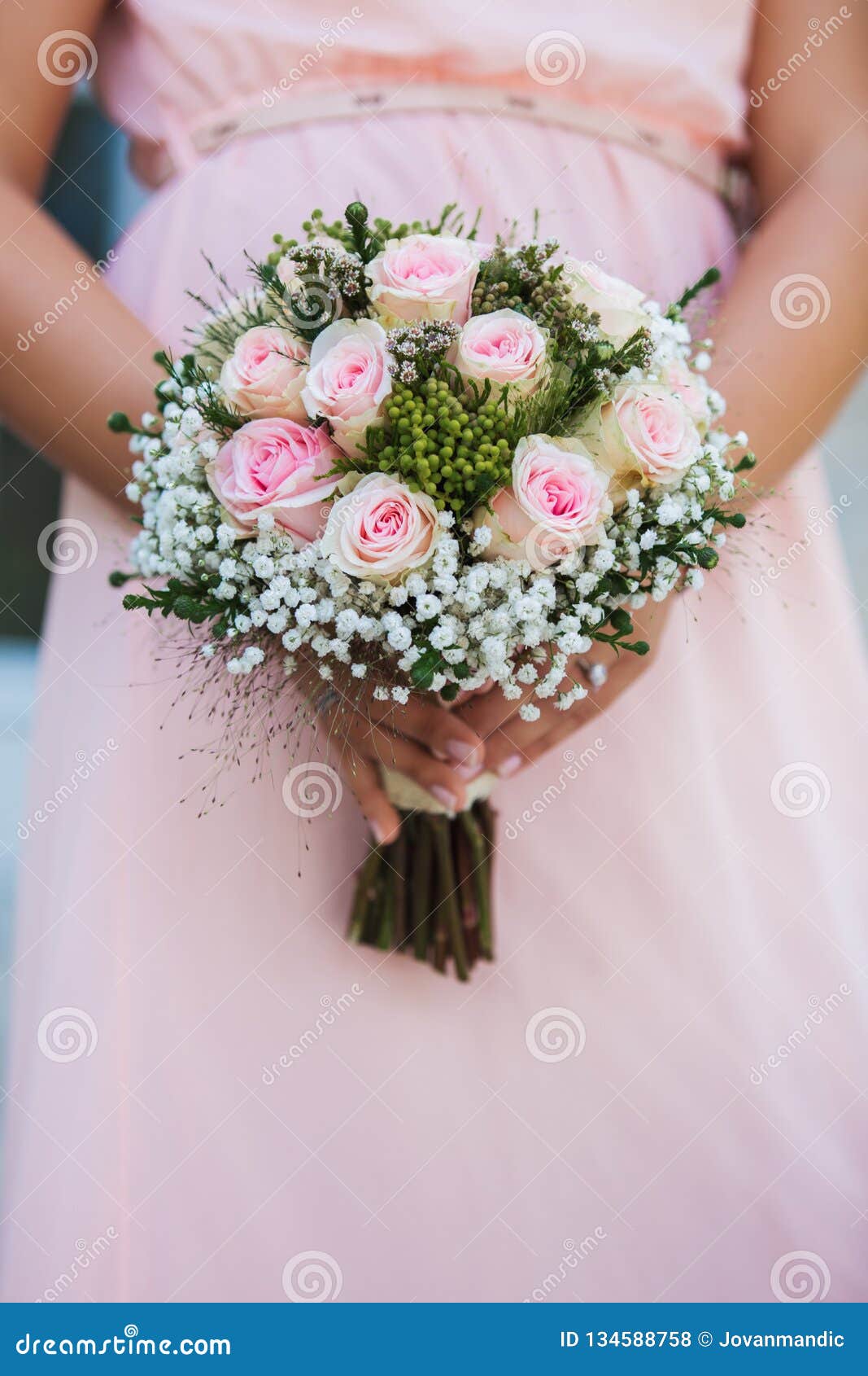 Wedding Bouquet of Flowers in Brides` Hands Stock Photo Image of