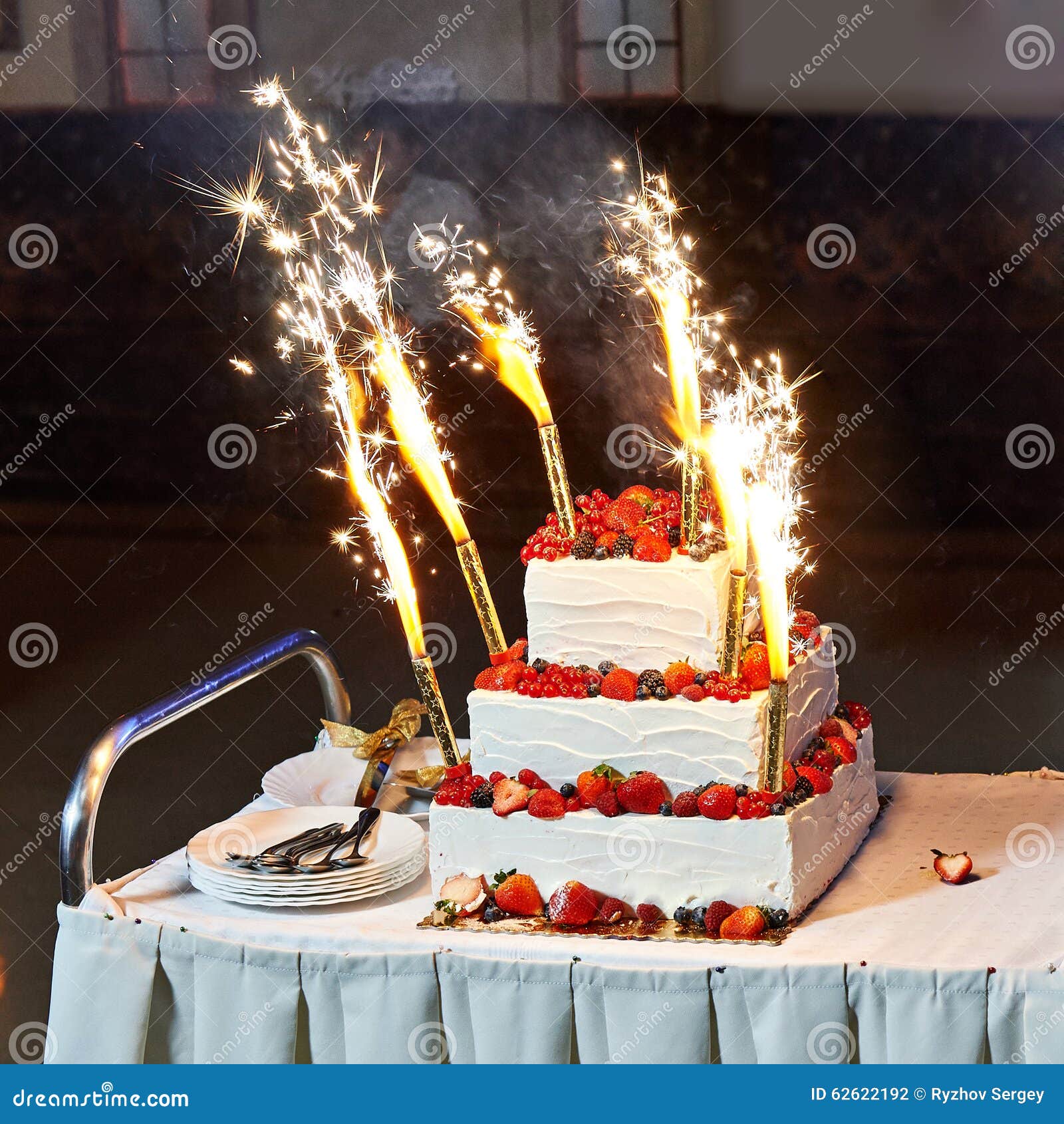 Wedding Cake with Berries and Fireworks Stock Photo - Image of ...