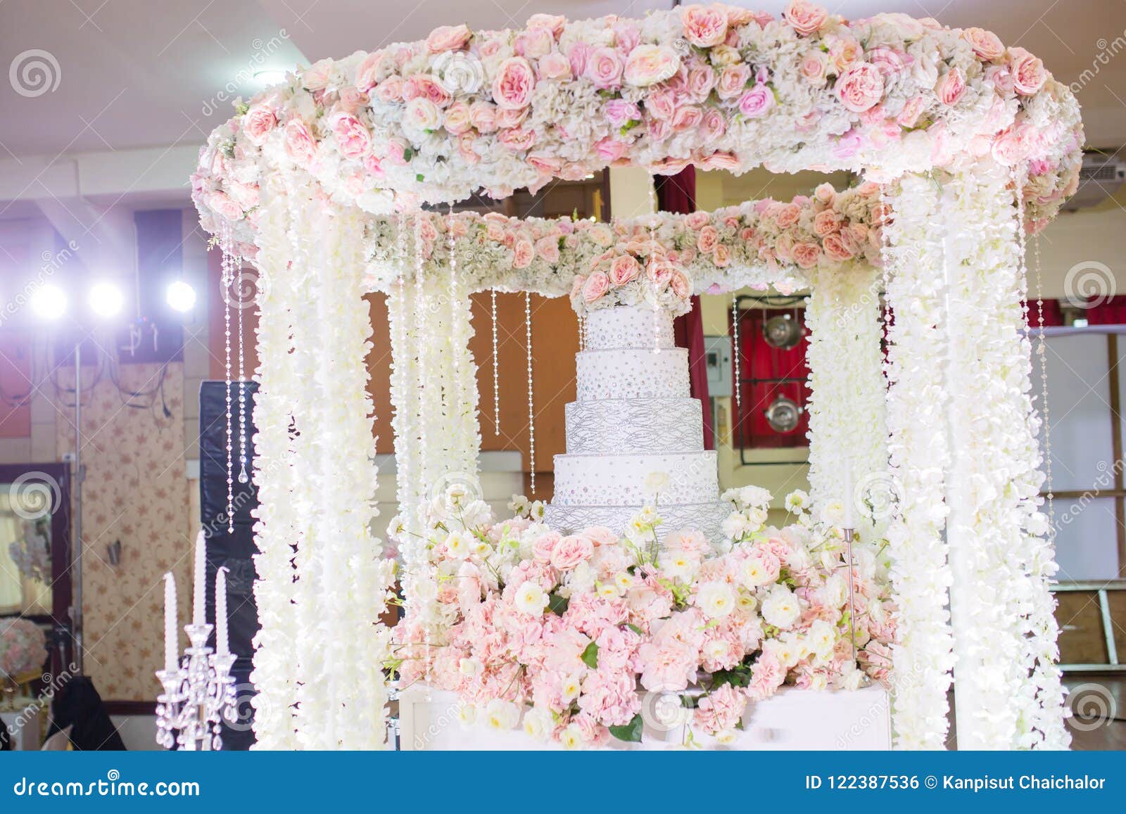 Wedding Candle on Flower Near Wedding Cake. Stock Photo Image of cake