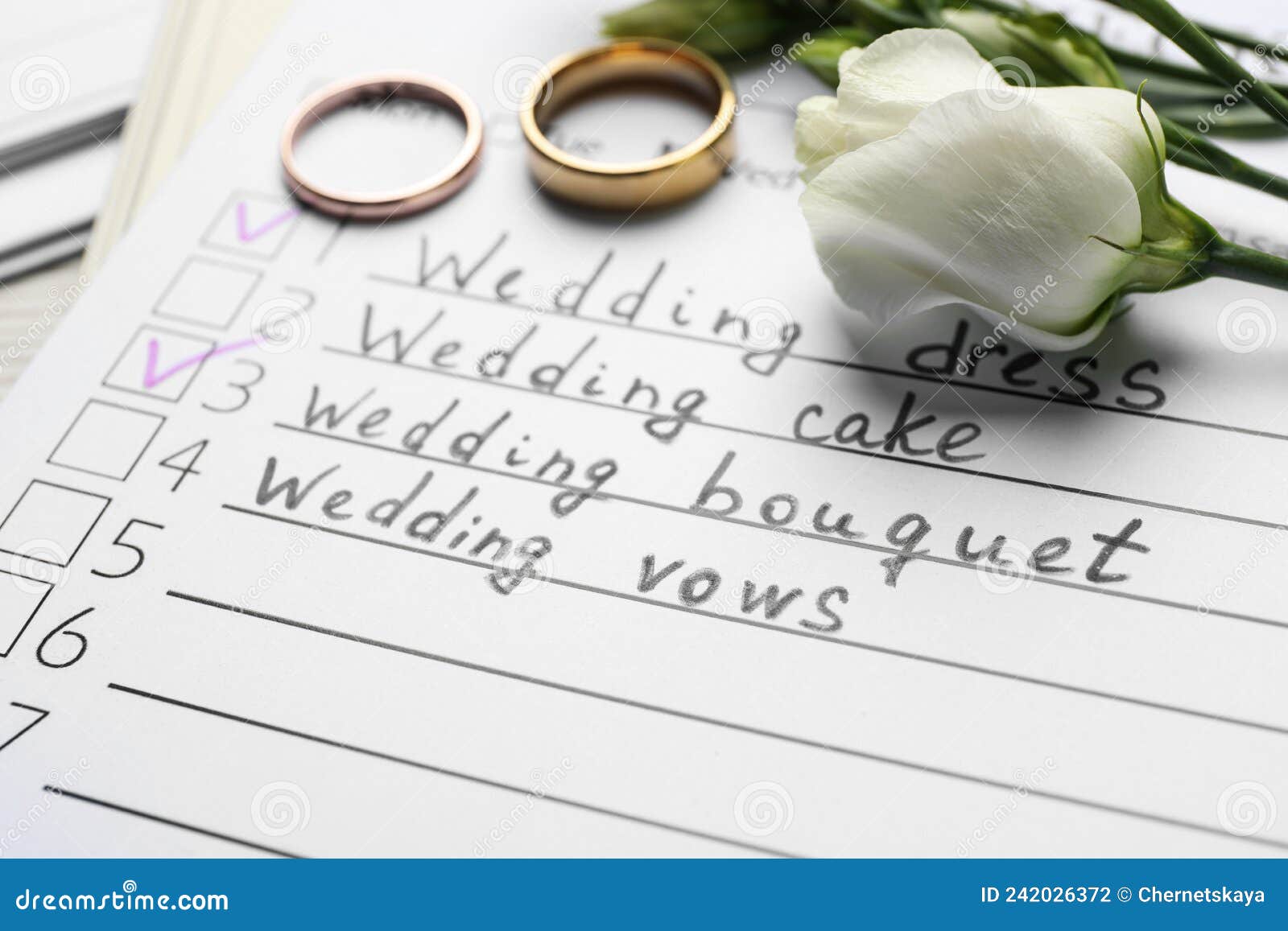 Wedding Checklist, Flowers and Rings, Closeup View Stock Photo Image