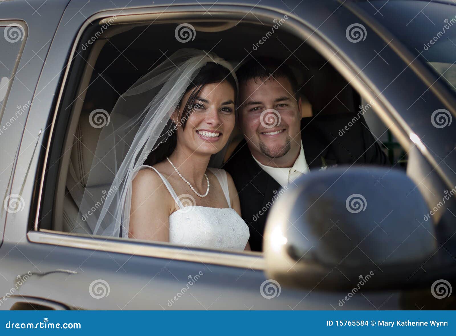 Wedding couple in car stock photo. Image of bunch, automobile 15765584