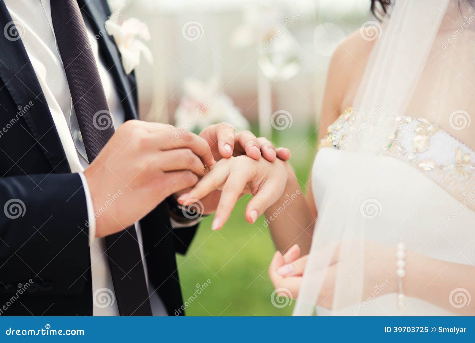 wedding couple hands close-up during wedding ceremony