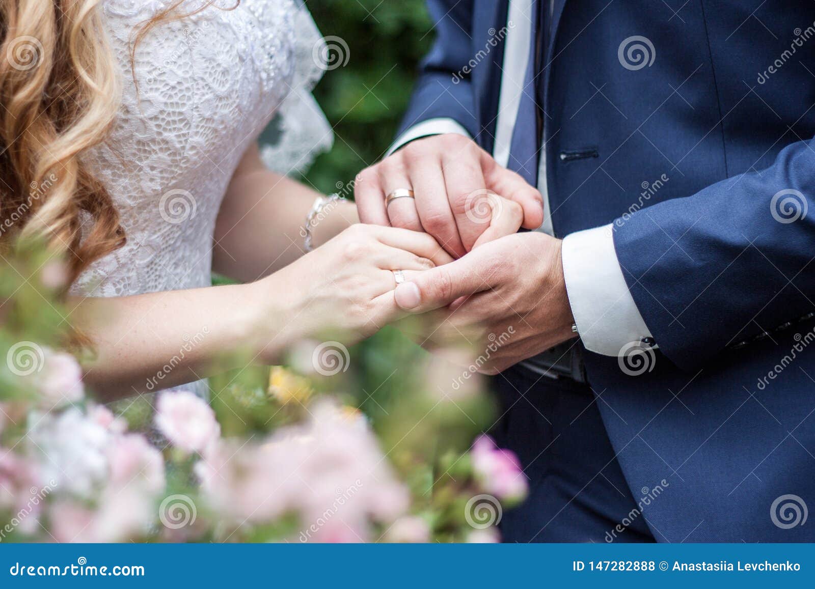 Wedding Couple Holding Hands, Happy Groom and Bride. Concept of ...