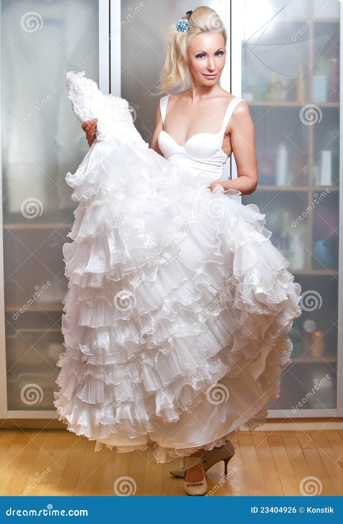 Wedding Dress in Hands at the Bride Stock Photo Image of buying