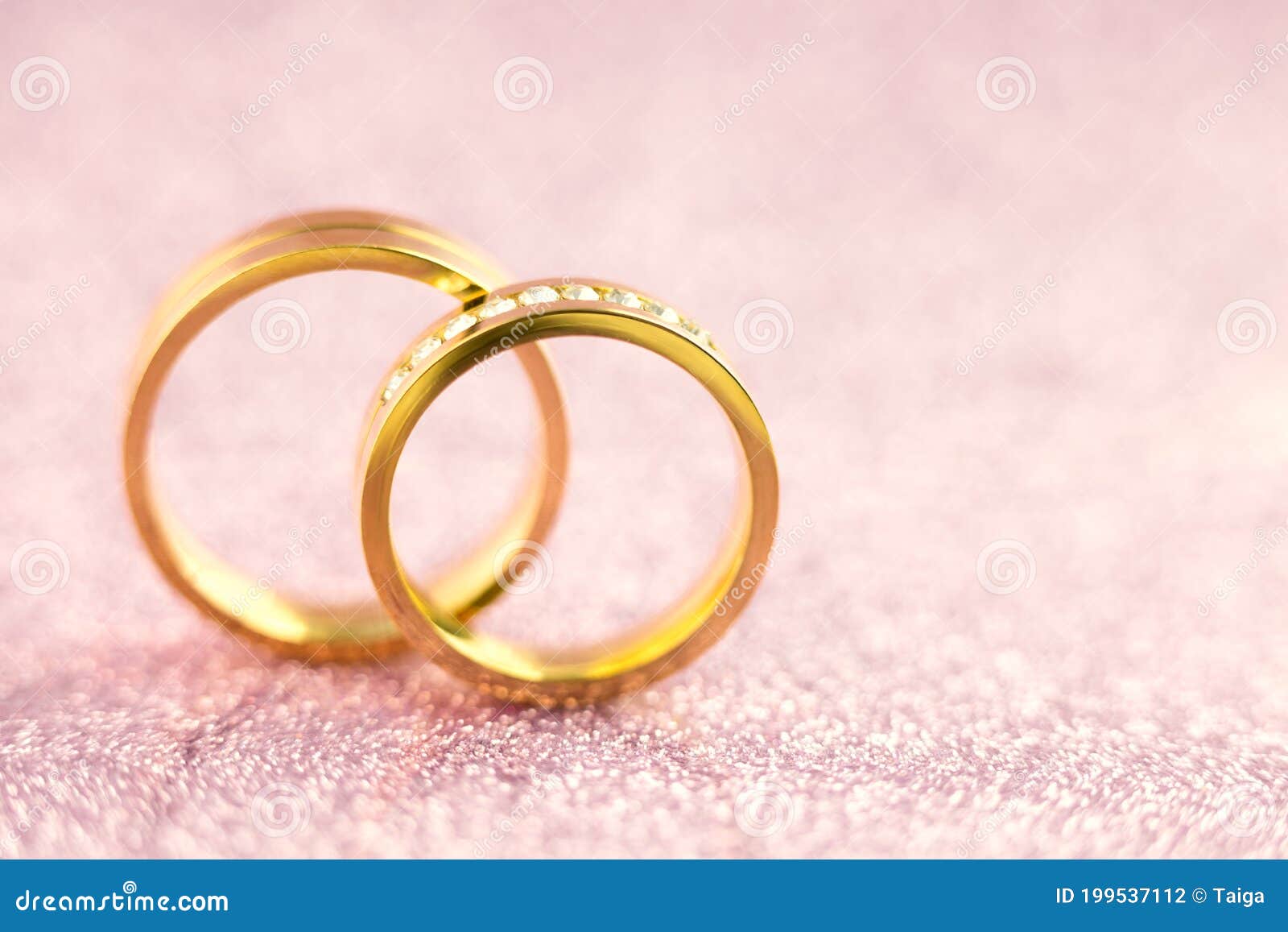 Wedding or Engagement Background - Pair of Golden Wedding Rings on Sparkle  Pink Backdrop Stock Photo - Image of marry, honeymoon: 199537112