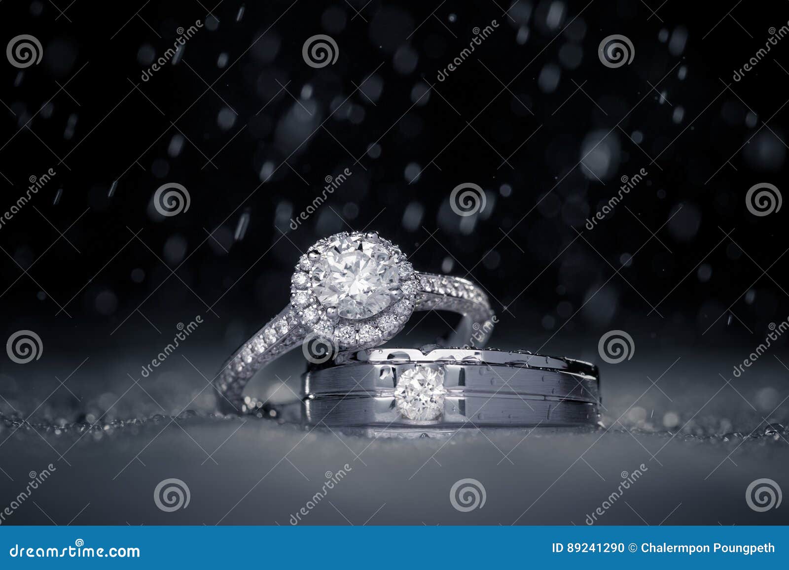 wedding engagement diamond rings with water drops