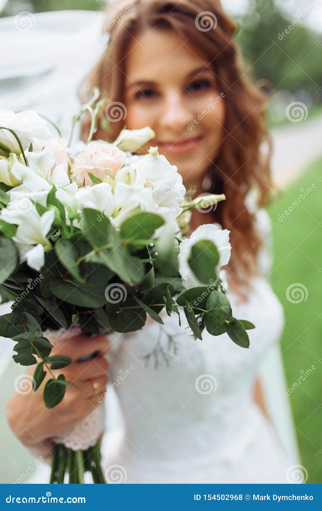 Wedding Flowers, Bride Holding Beautiful Flowers, Decor Stock Photo