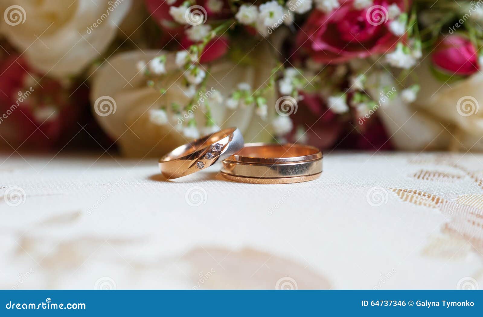 Wedding Gold Rings On A Background Of Red Roses Stock Photo - Image of ...