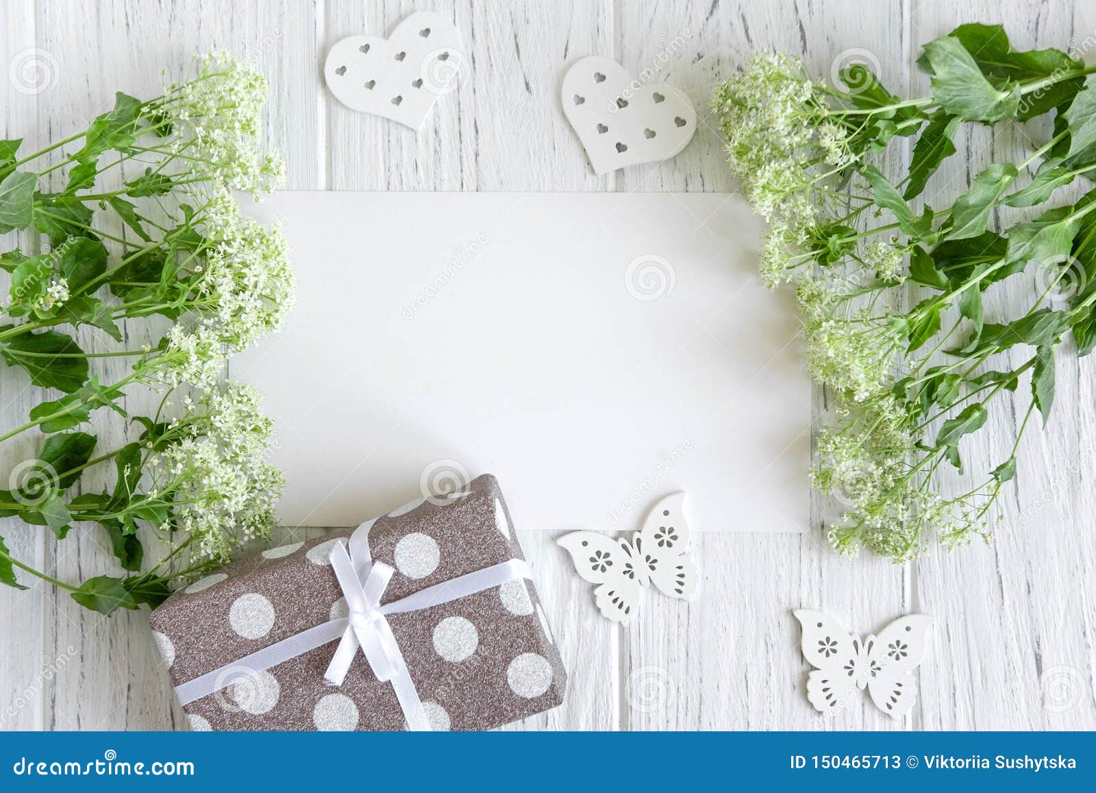 Wedding Greeting Card Mockup with Green Flowers and Gift on White ...
