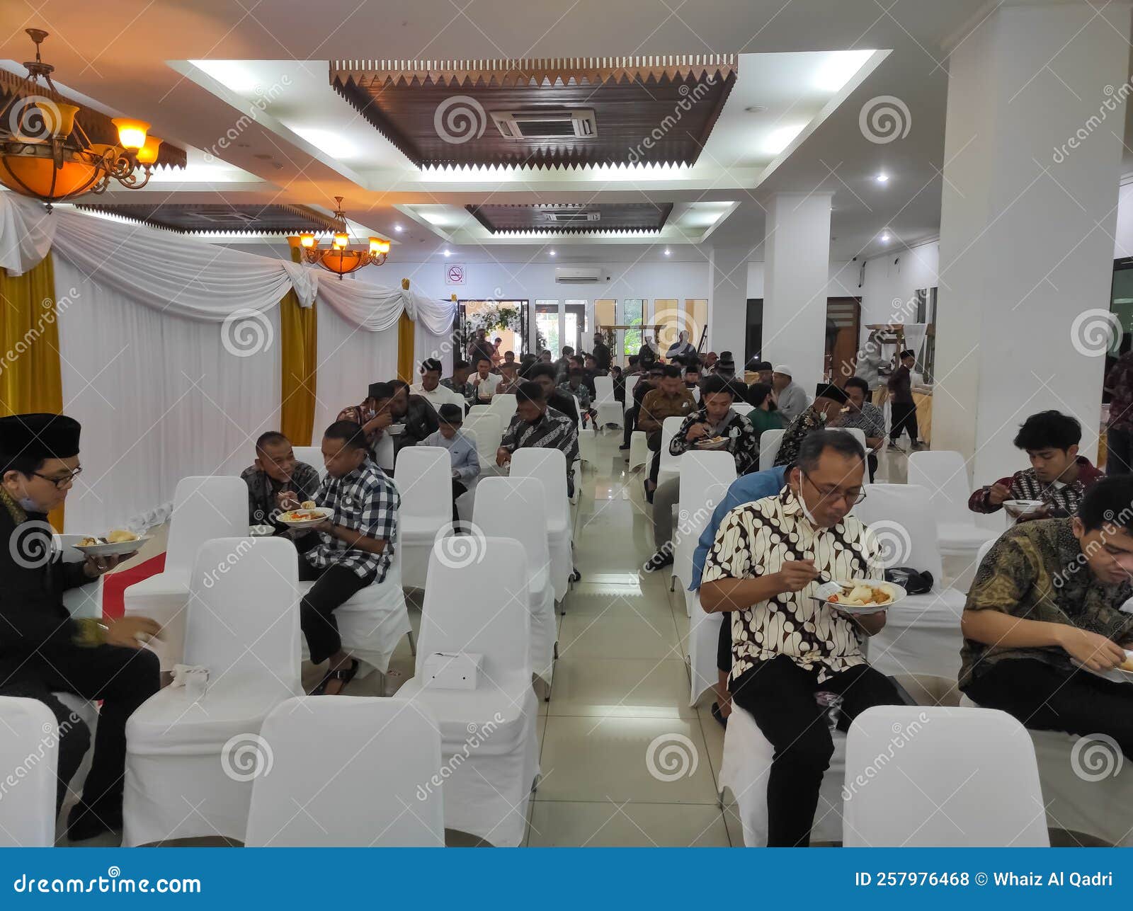 Wedding Guests Enjoying a Wedding Buffet Meal Editorial Stock Photo