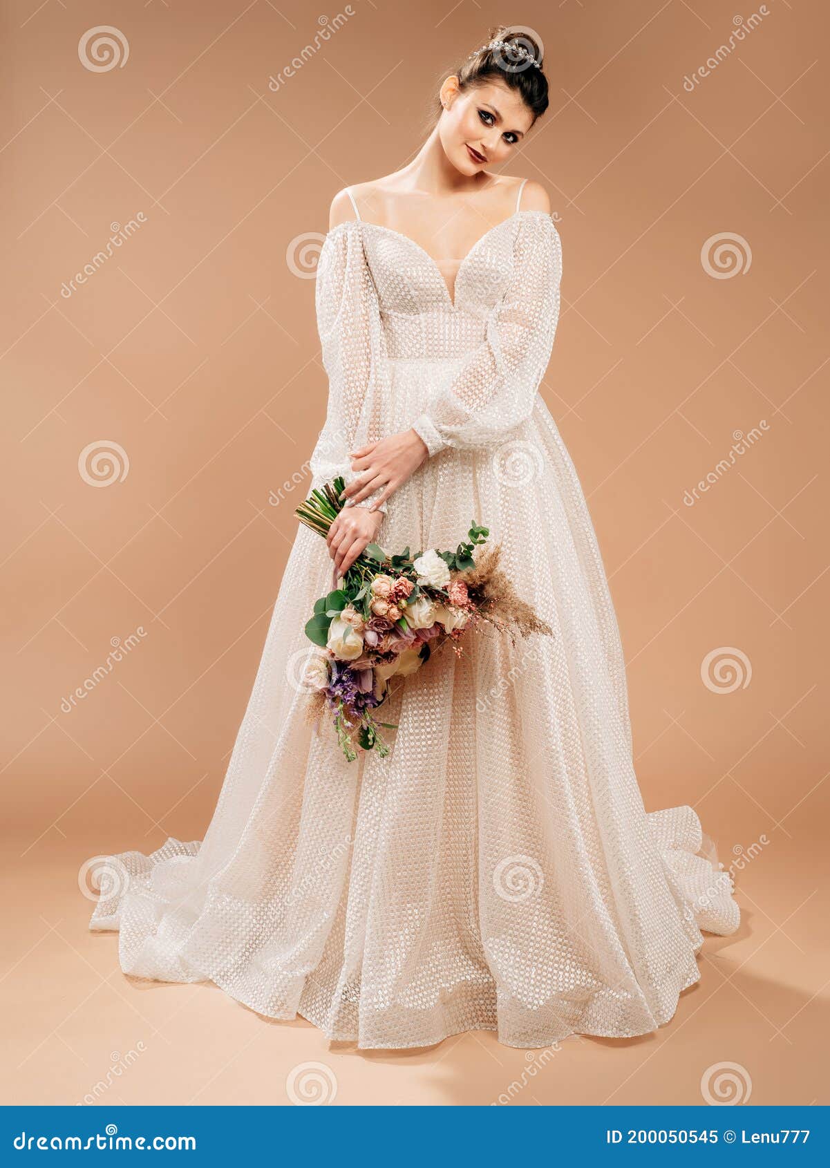 Wedding Inspiration. Beautiful Caucasian Model in White Wedding