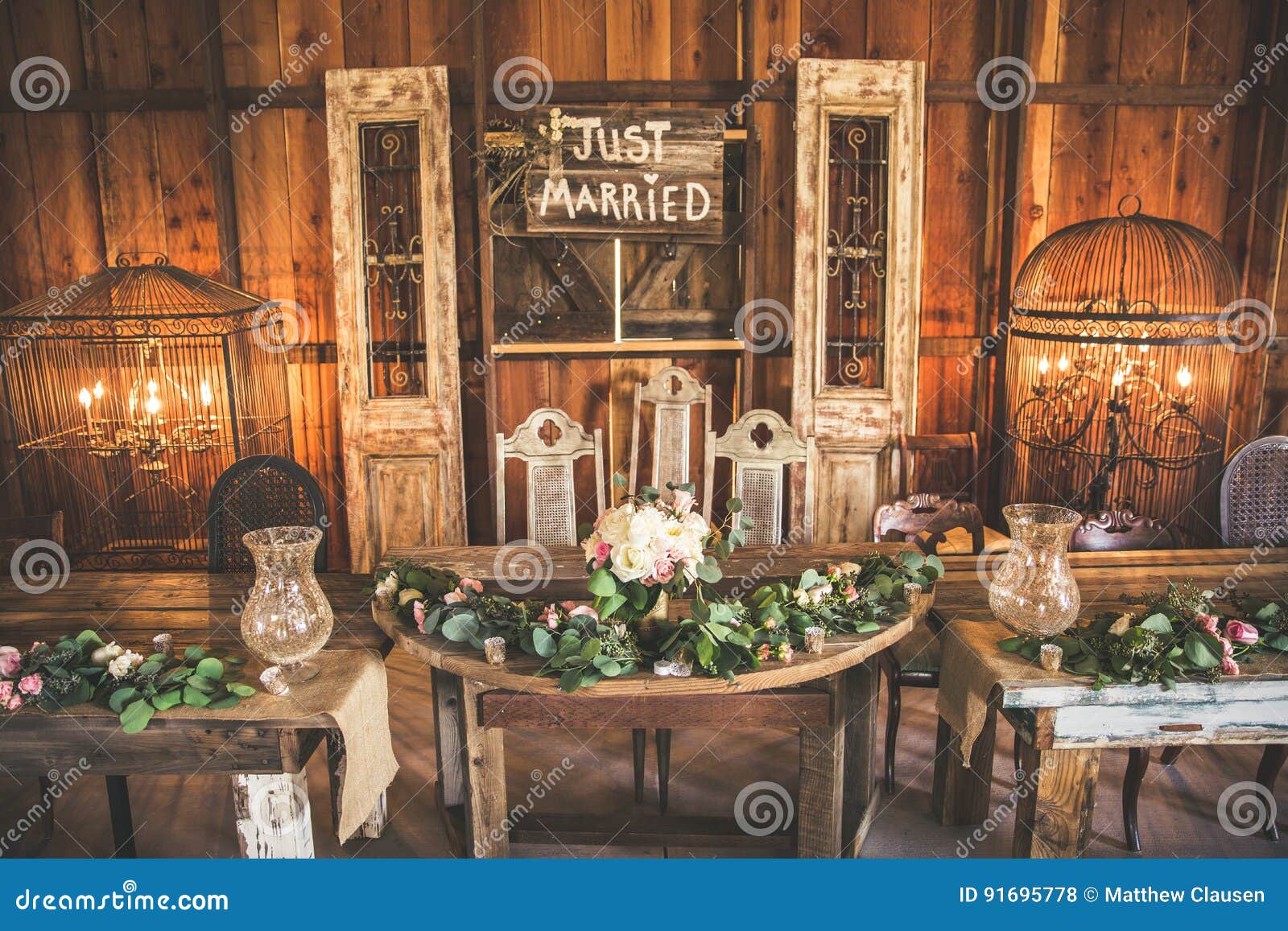 wedding party table in a barn