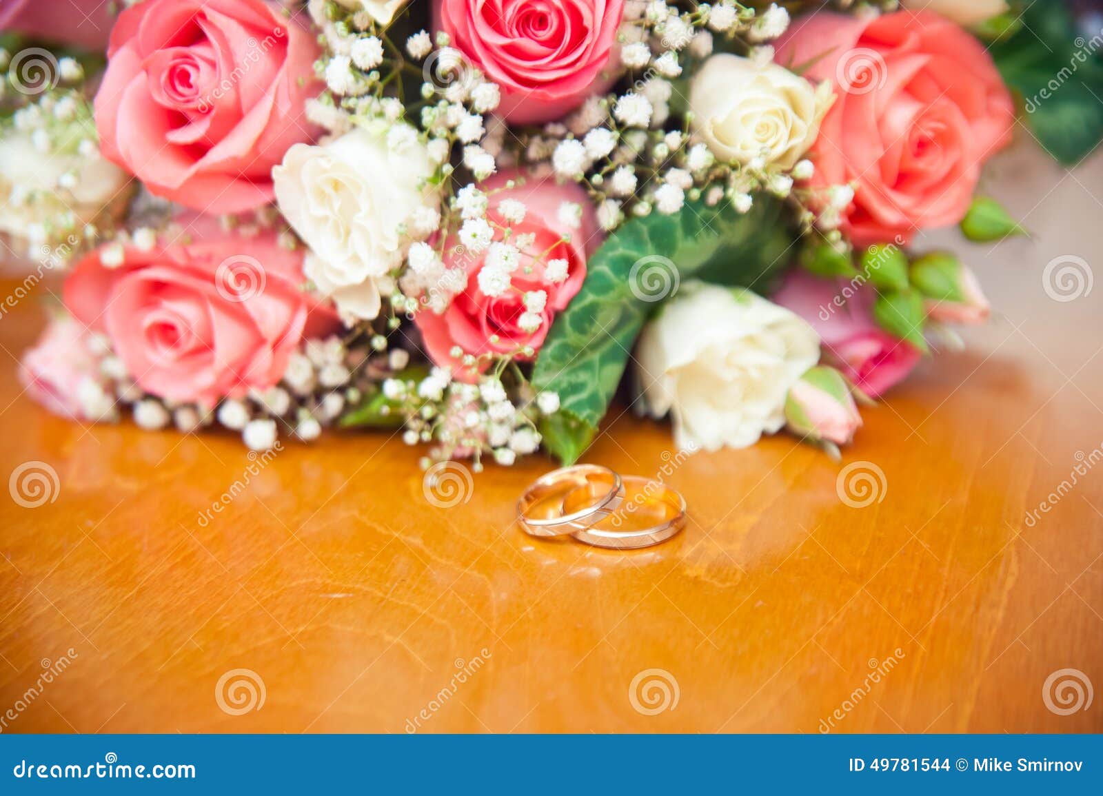 Wedding Rings on a Background of a Wedding Bouquet Bride Stock Photo ...
