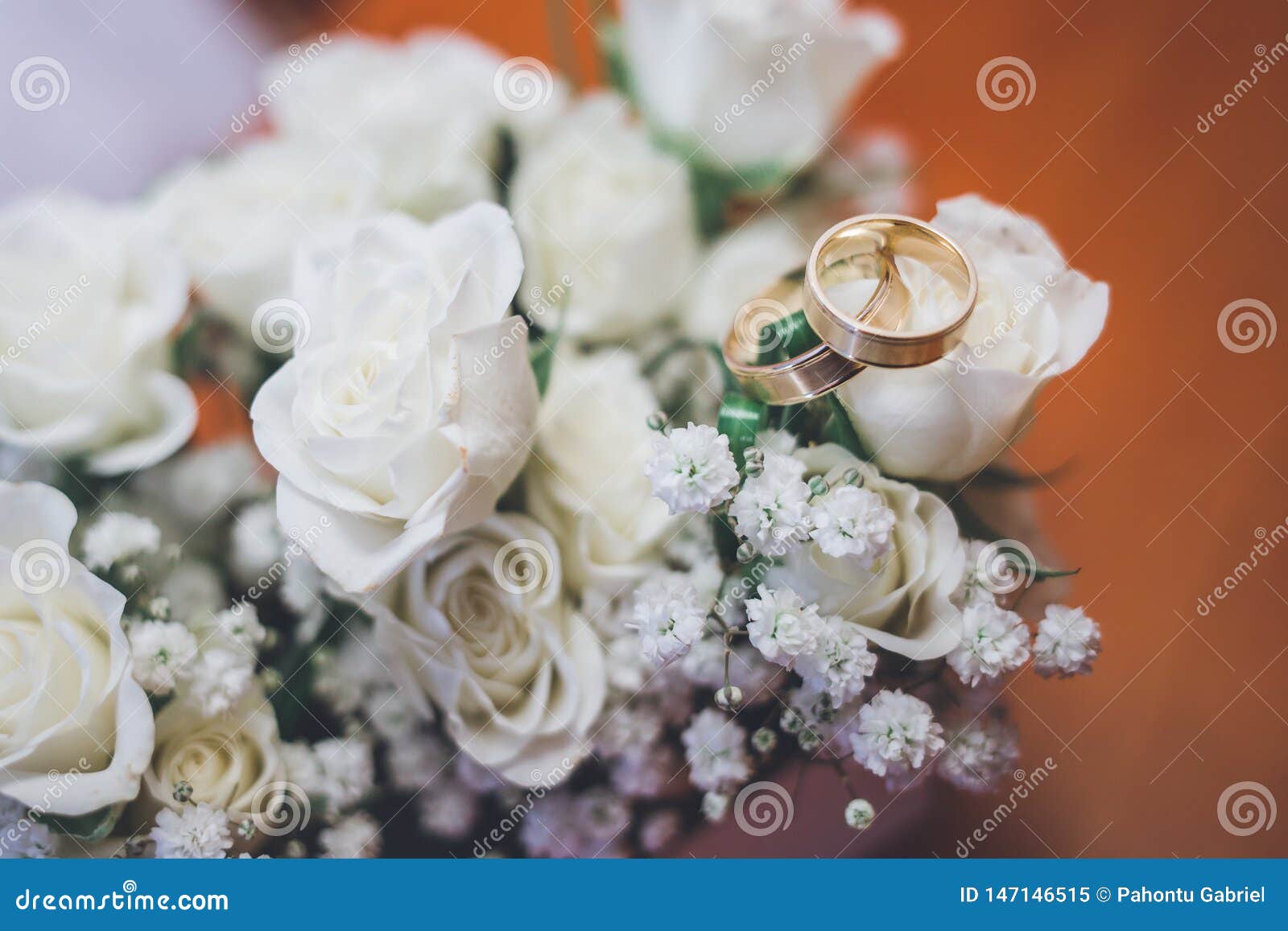 Wedding Rings on Beautiful White Flowers Bouquet. Copy Space. Stock ...