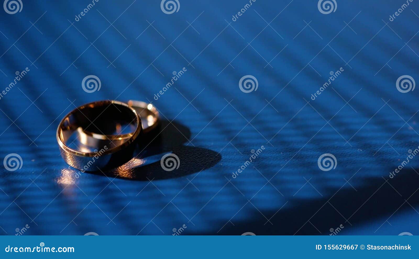 Wedding Rings on Blue Background. Closeup Stock Video Video of metal