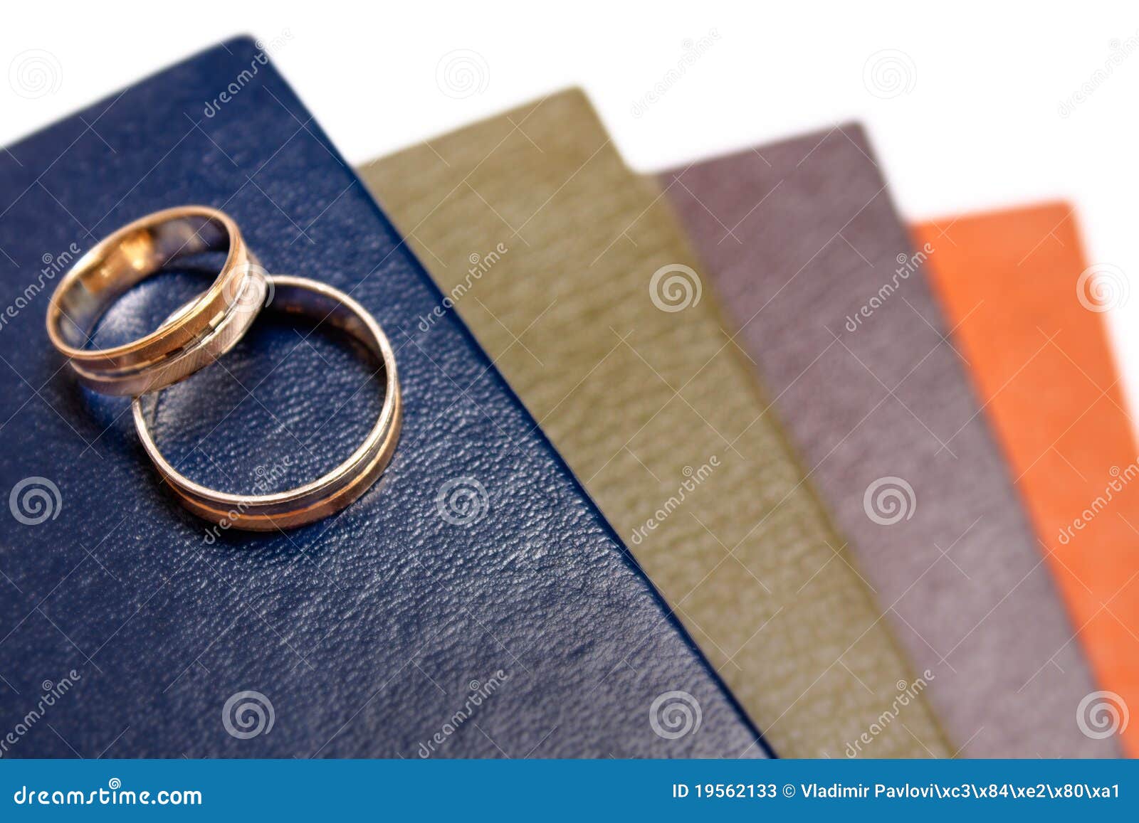 Wedding rings on book stock image. Image of book, jewelry 19562133