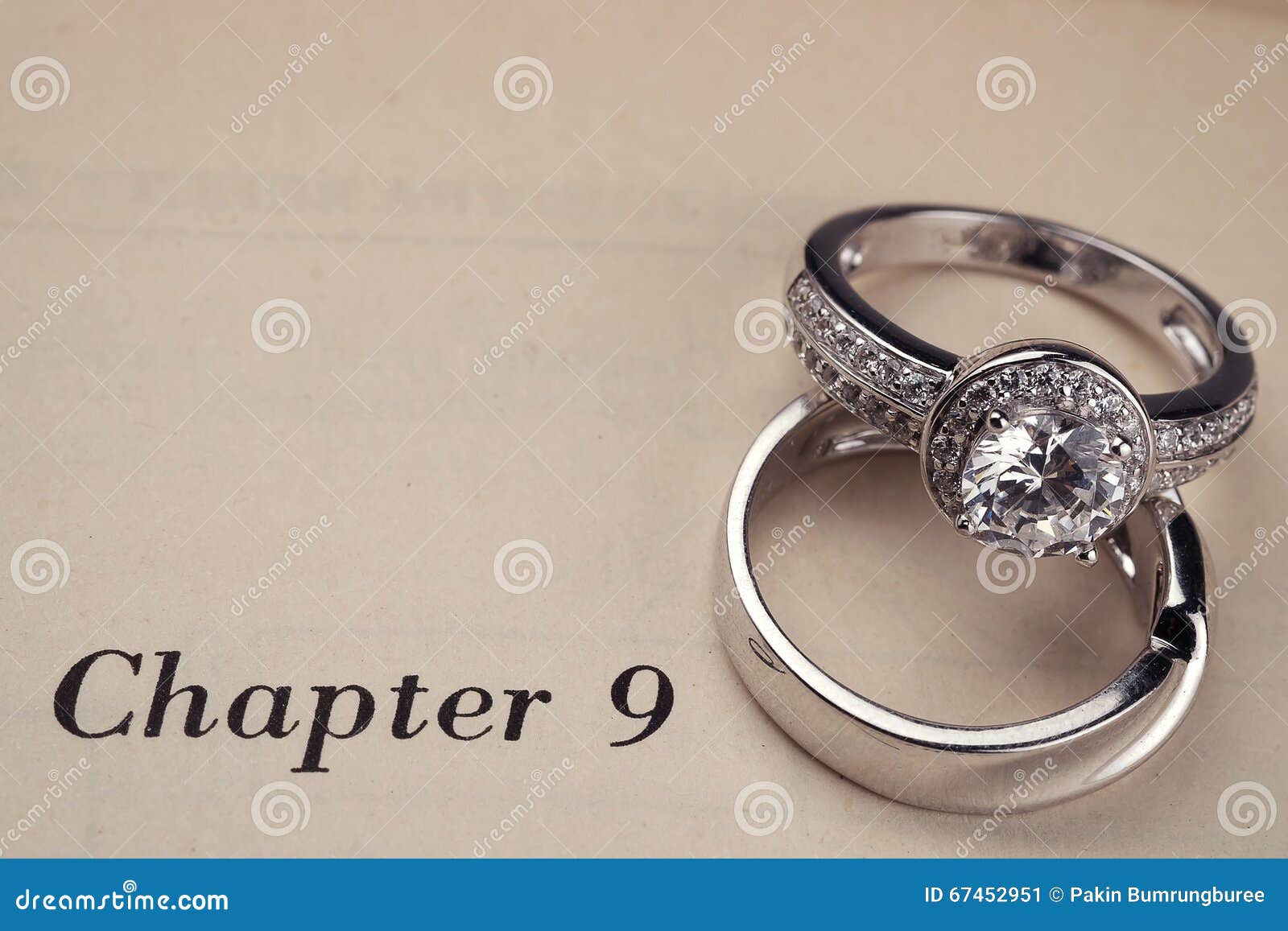 Wedding rings on book stock image. Image of emotion, bridal 67452951