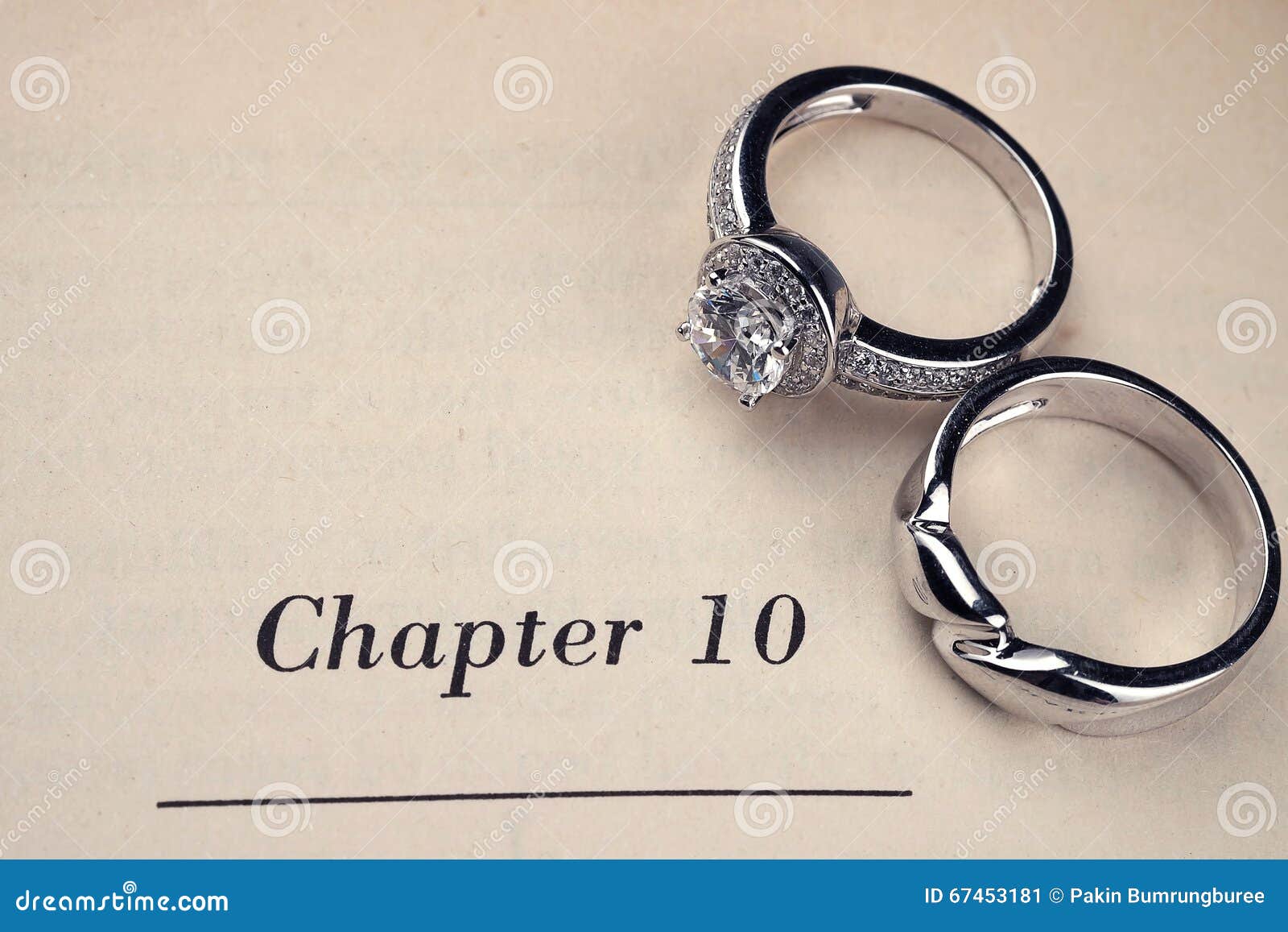 Wedding rings on book stock image. Image of flower, lace 67453181