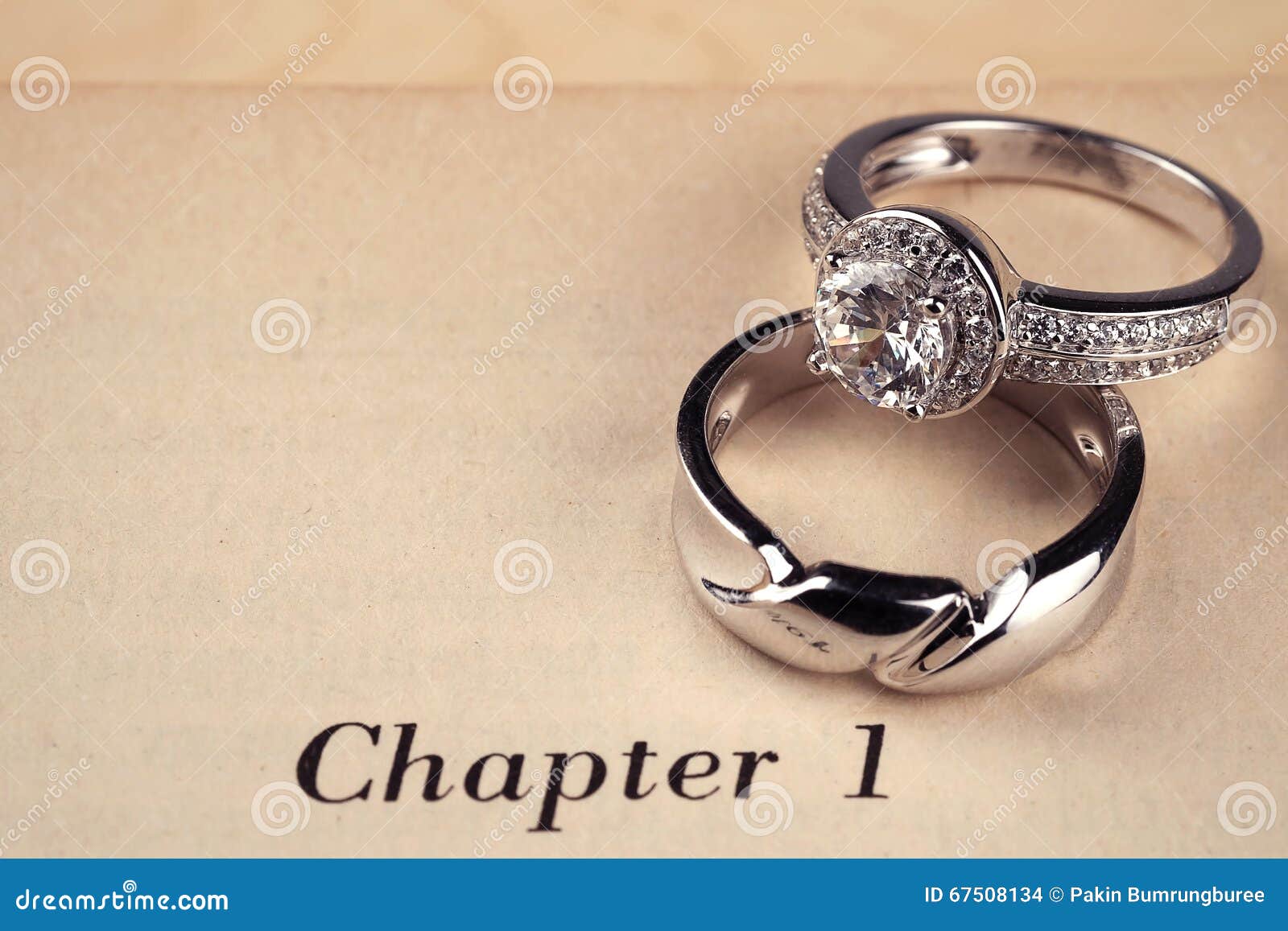 Wedding rings on book stock photo. Image of beauty, bridal 67508134