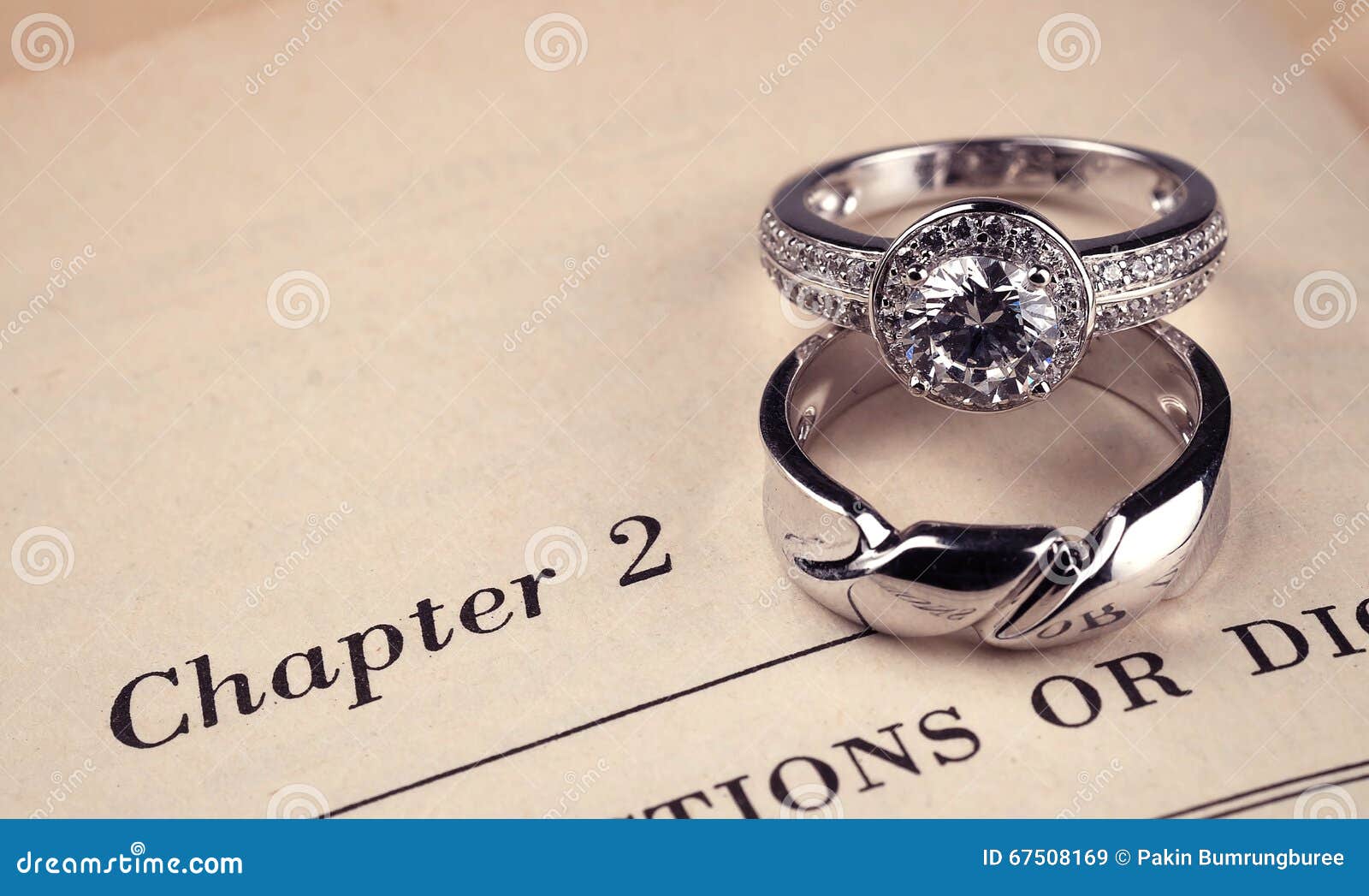 Wedding rings on book stock image. Image of celebration 67508169