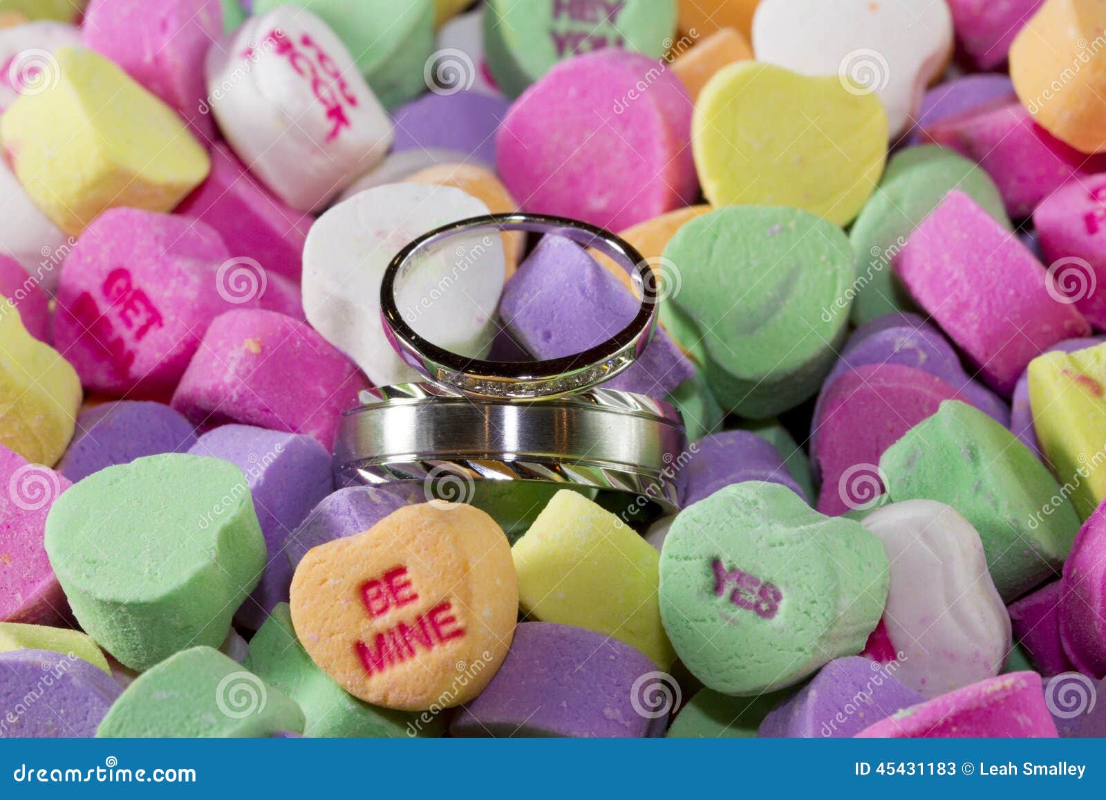 Wedding rings in candy stock image. Image of silver, candy 45431183