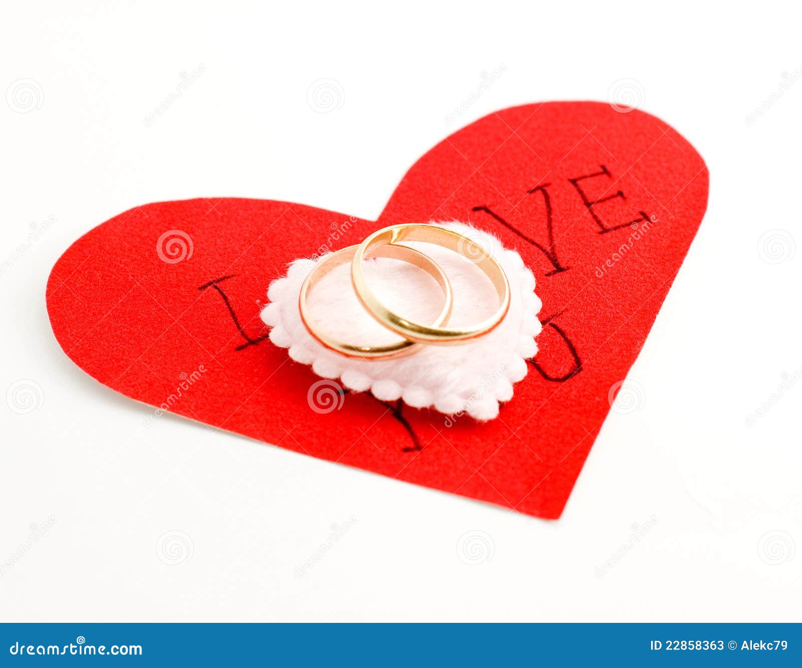 Wedding rings on the heart stock image. Image of pattern 22858363