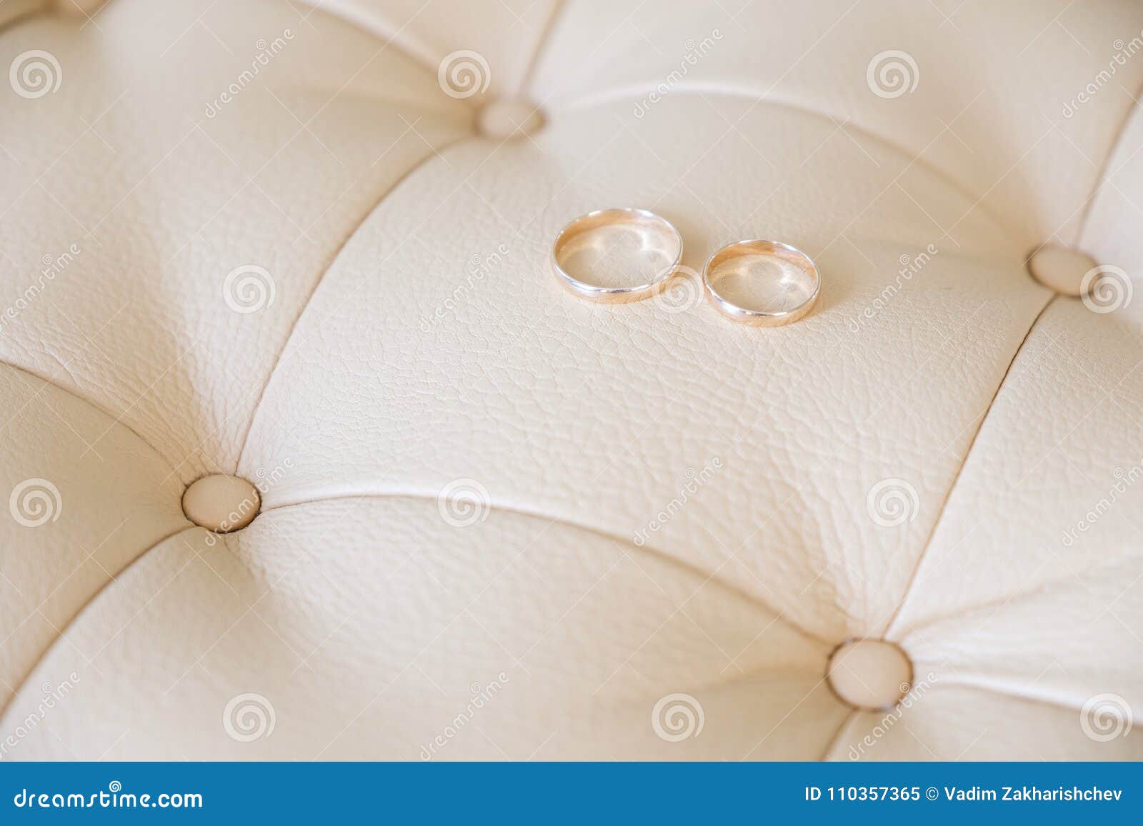 Wedding Rings on a Light Leather Sofa. Side View. Stock Image Image of celebration, engagement