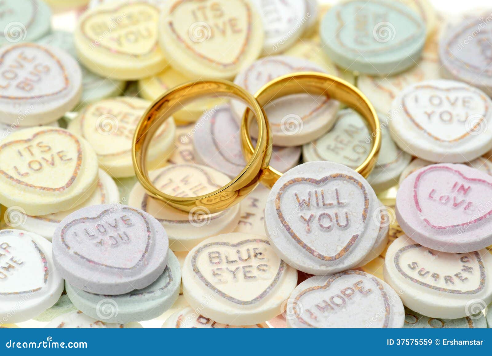 wedding rings and loveheart candy sweets