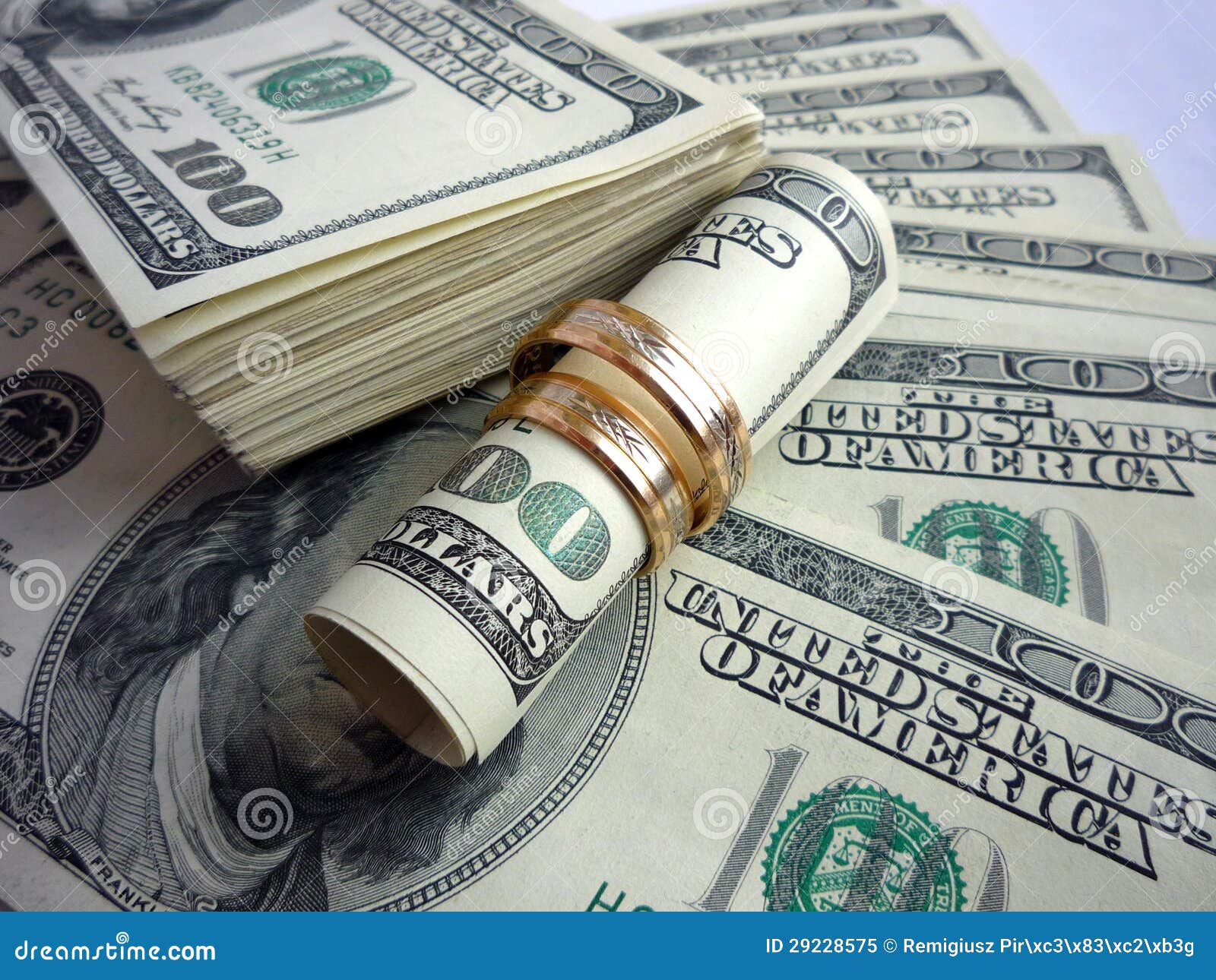 Wedding rings on the money stock image. Image of number 29228575