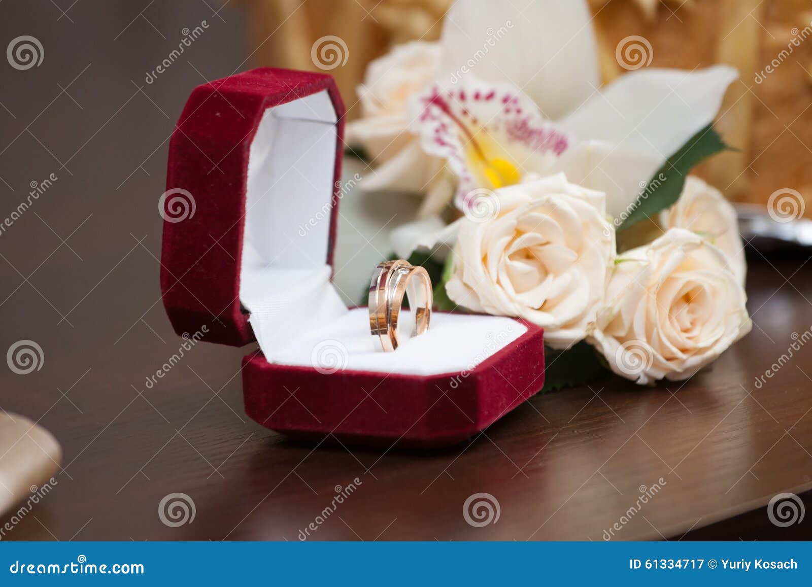 Wedding rings with roses stock image. Image of wooden - 61334717