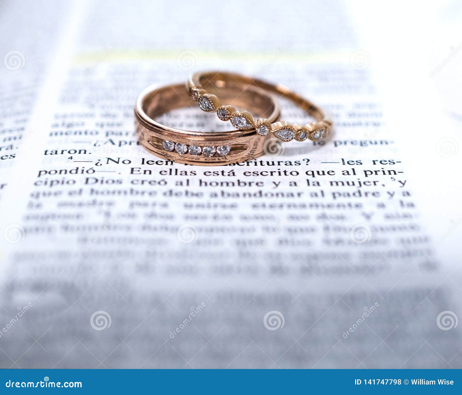 wedding rings and spanish bible scripture