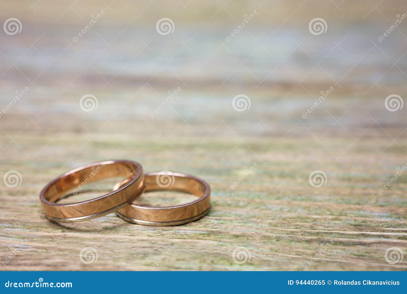 Wedding rings on wood stock image. Image of gold, jewel 94440265