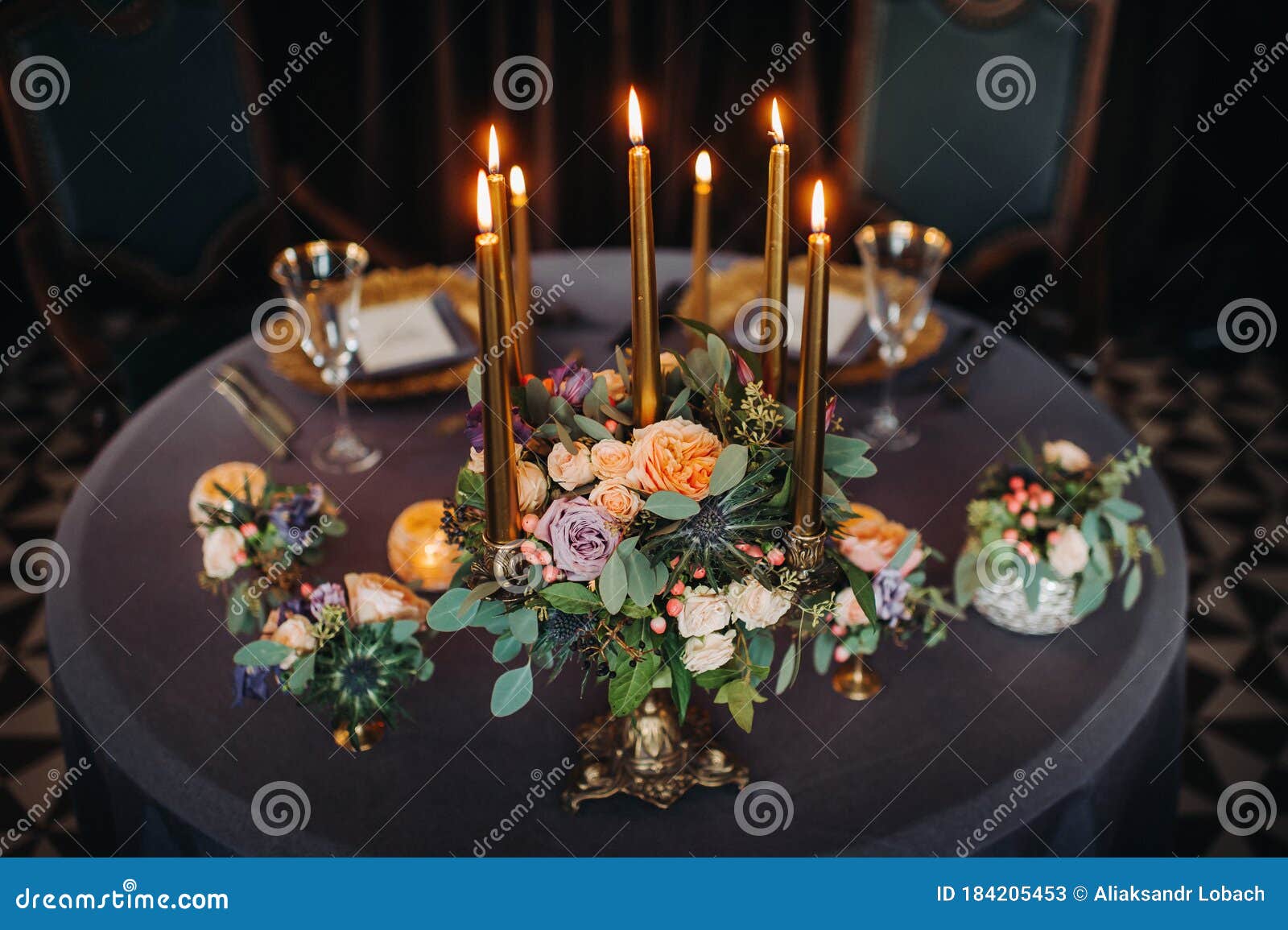 Wedding Table Decoration with Flowers on the Table in the Castle, Table