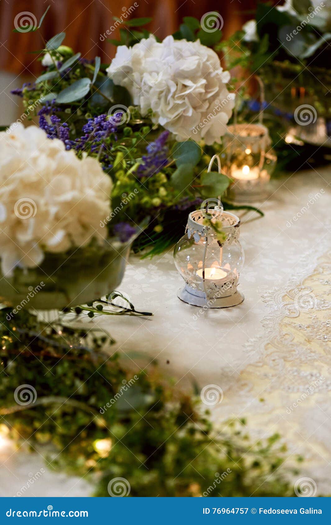 Wedding Table Decoration With White Hydrangeas A Lace Tablecloth