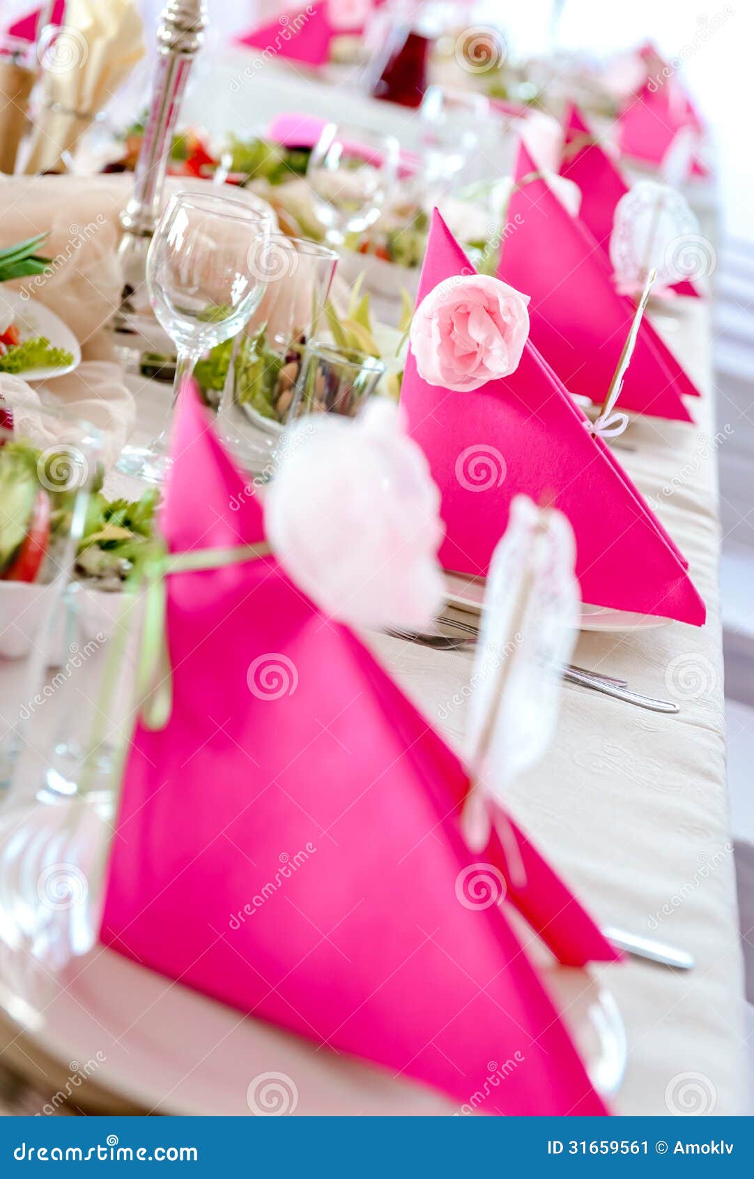 Wedding Table Decorations in pink and white colors, napkins close-up.