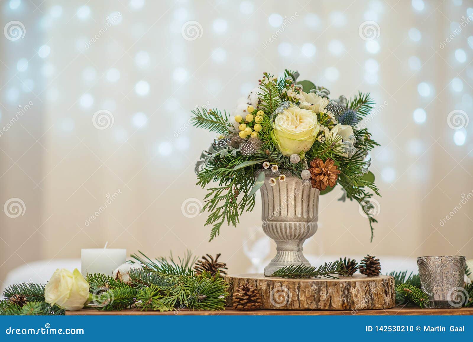 wedding table with floral arrangement prepared for reception, wedding, birthday or event centerpiece